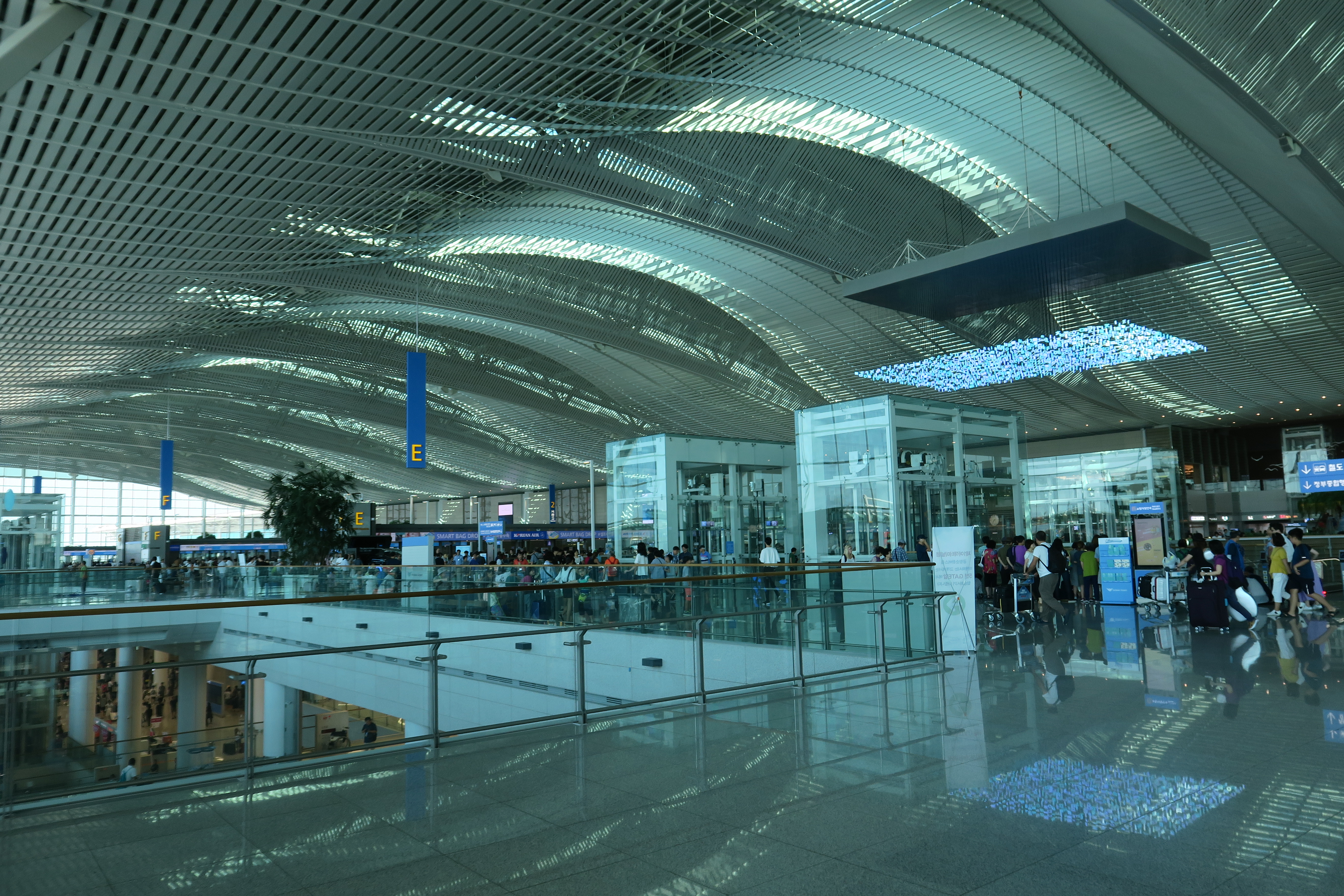 a large glass building with a glass roof