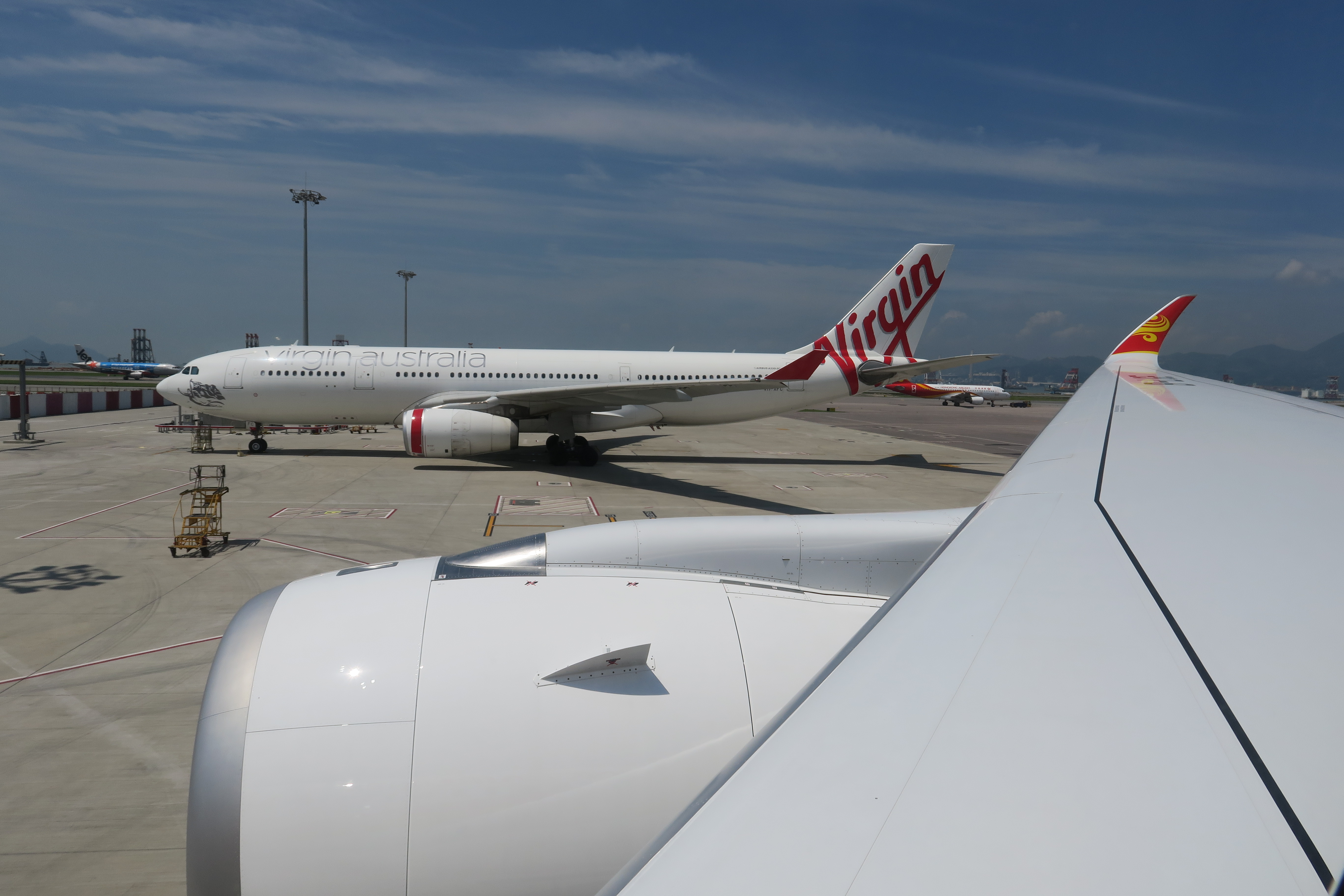 a white airplane on the runway