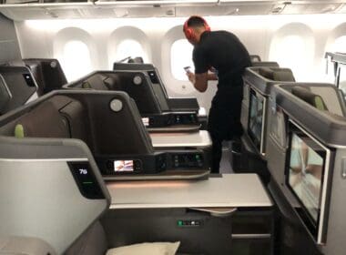 a man standing in an airplane