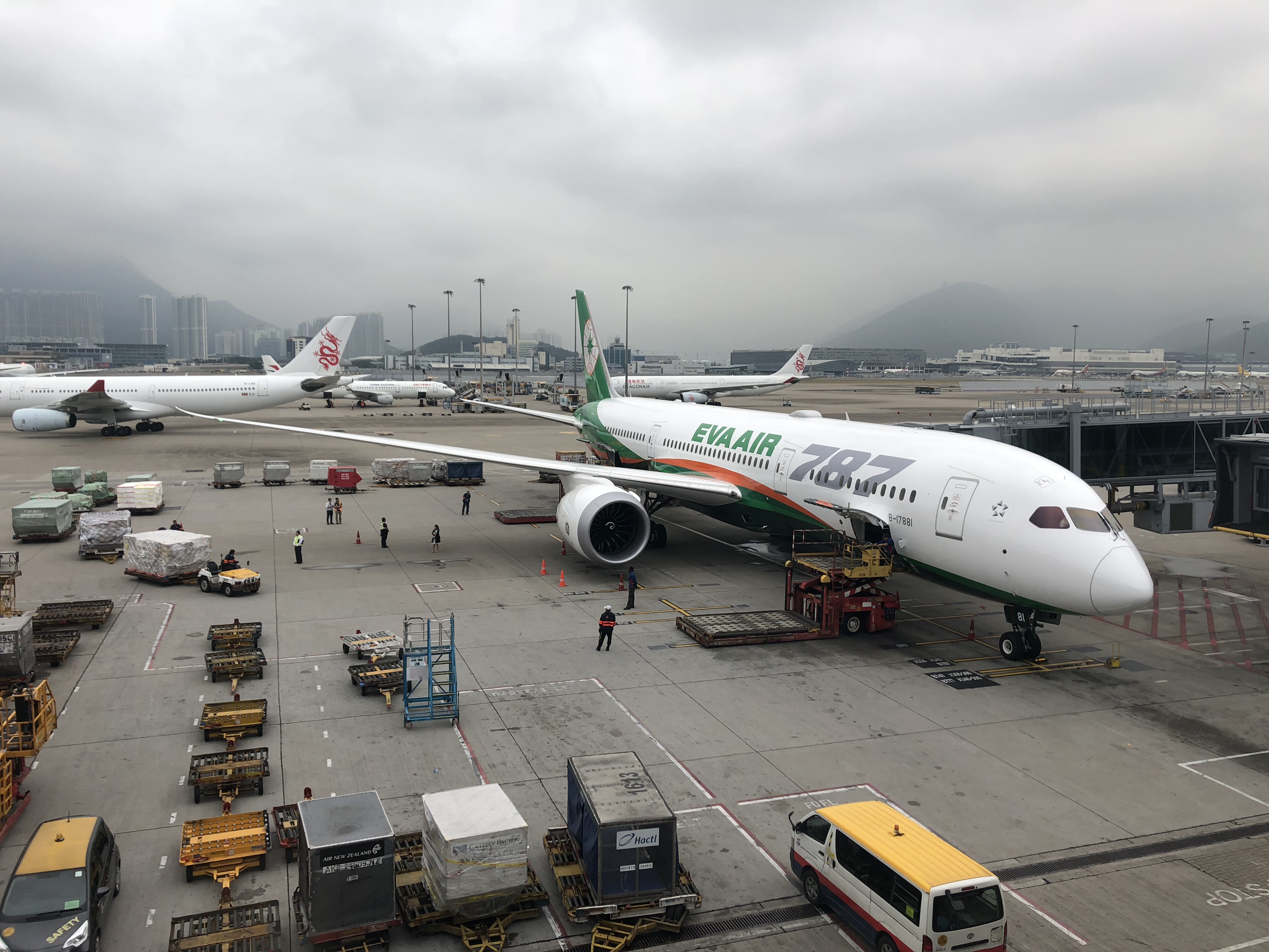 a group of airplanes at an airport