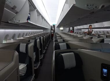 a man standing in an airplane