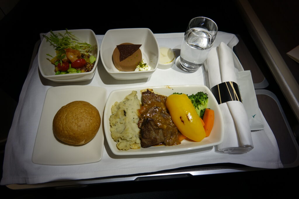 a plate of food on a tray