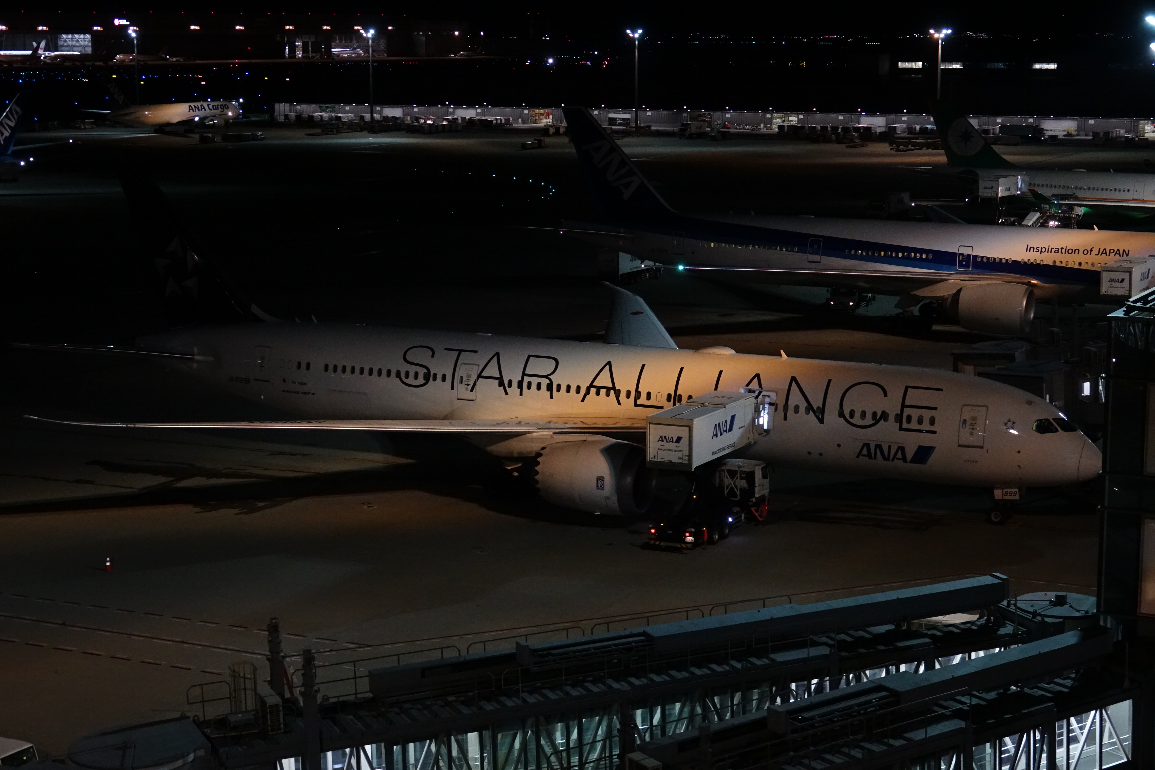 a group of airplanes at an airport