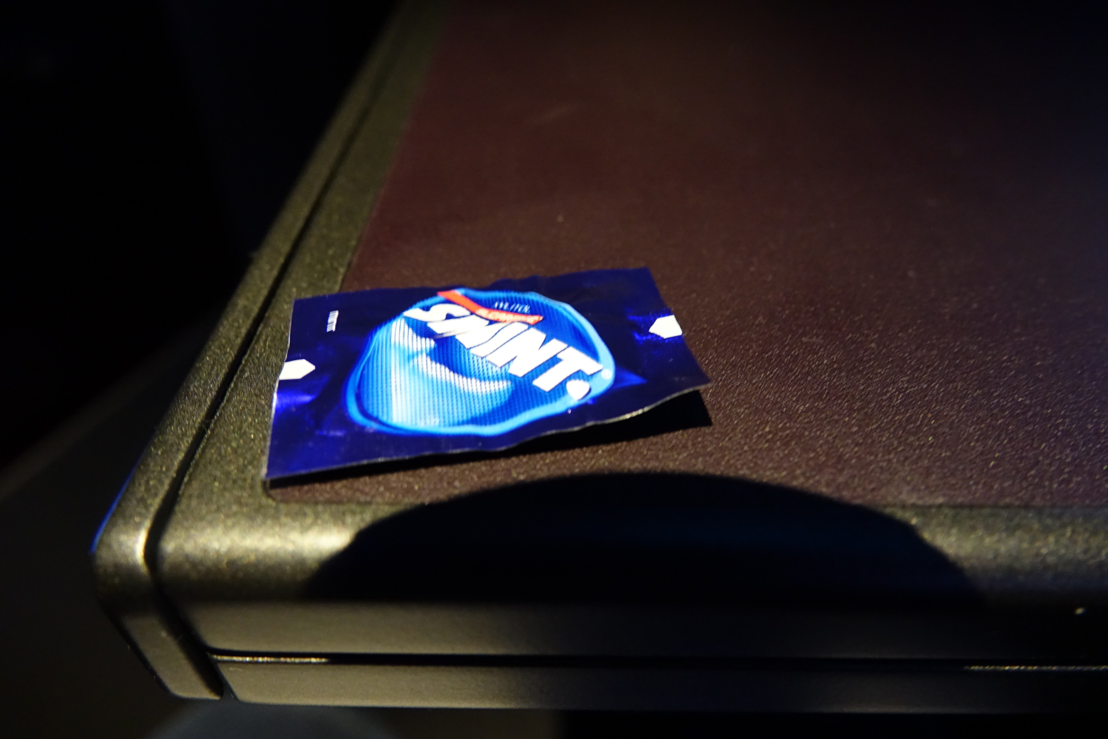 a small packet of candy on a table