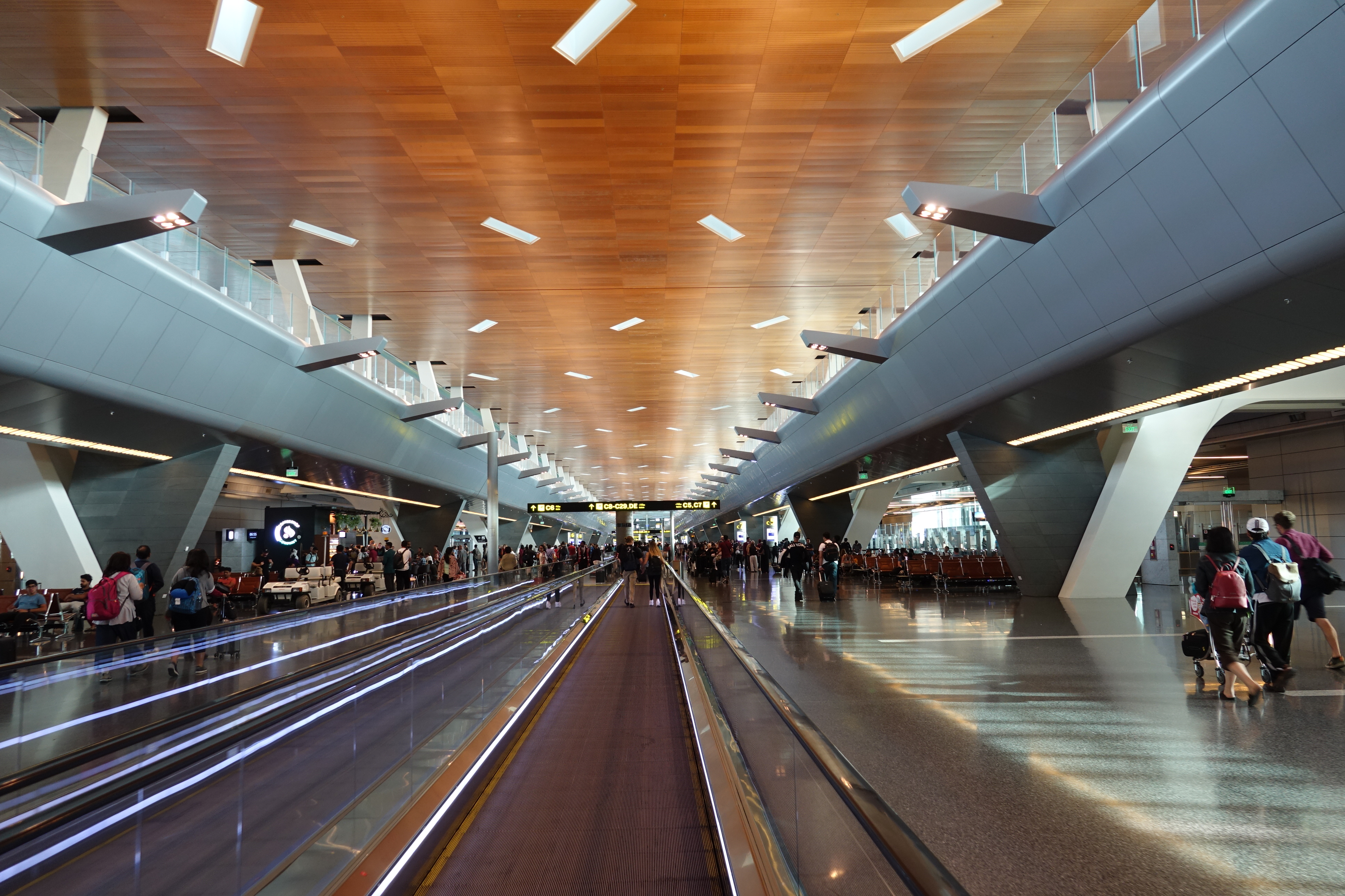 a group of people in an airport