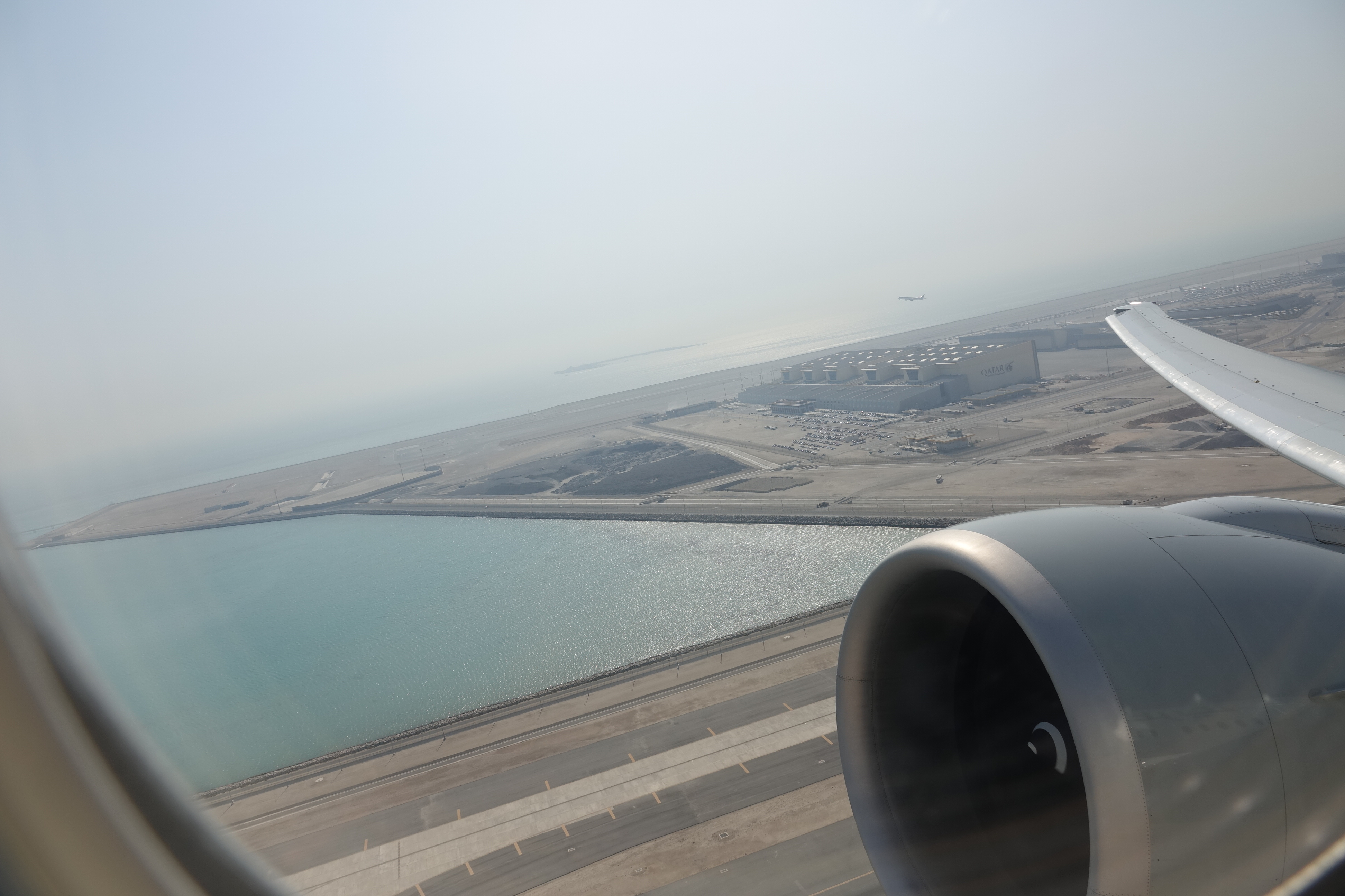 an airplane wing and engine of an airplane