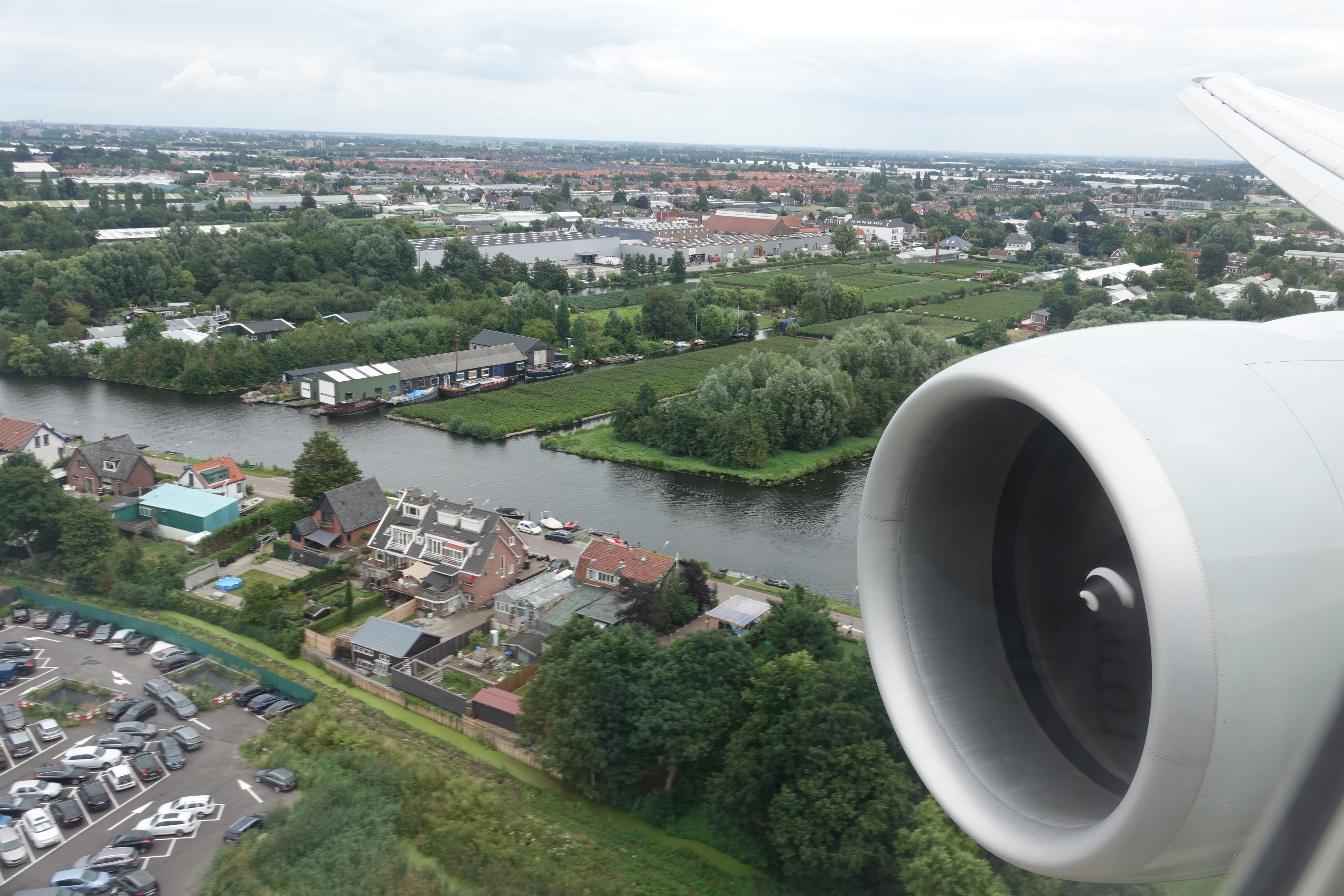 a view of a river and a city from an airplane