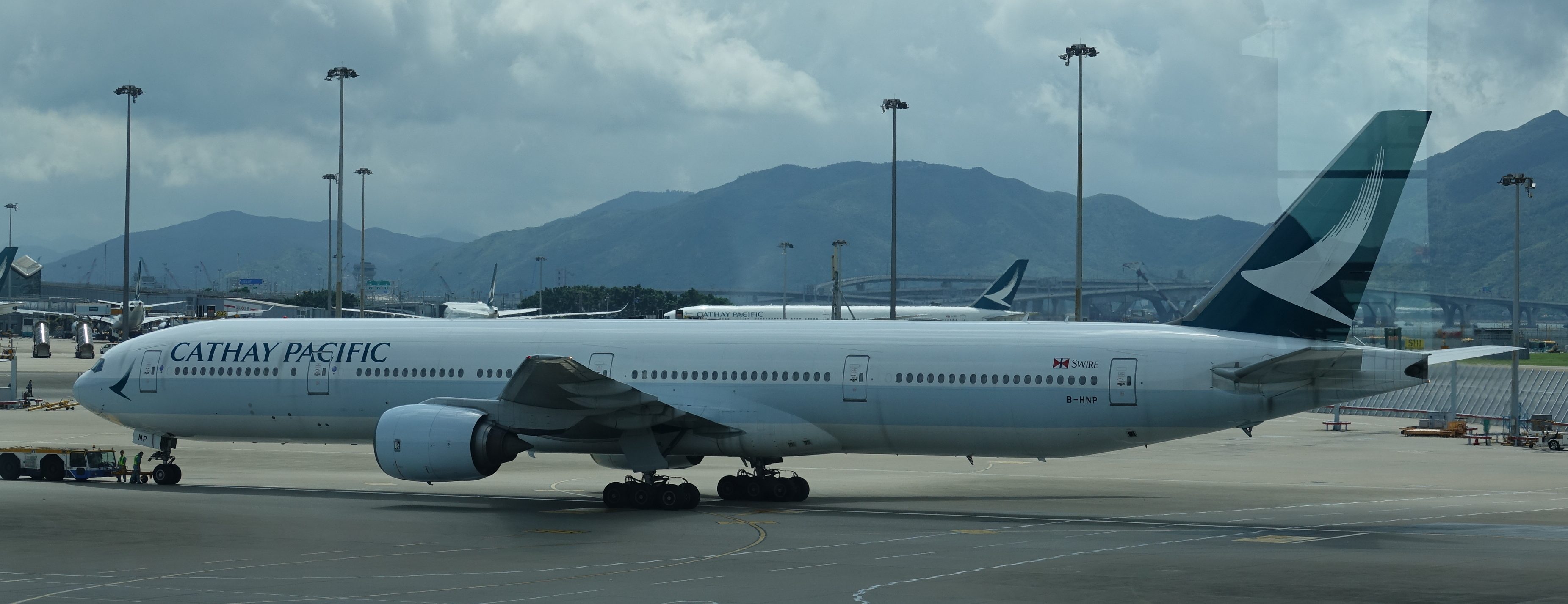 a large white airplane on a runway