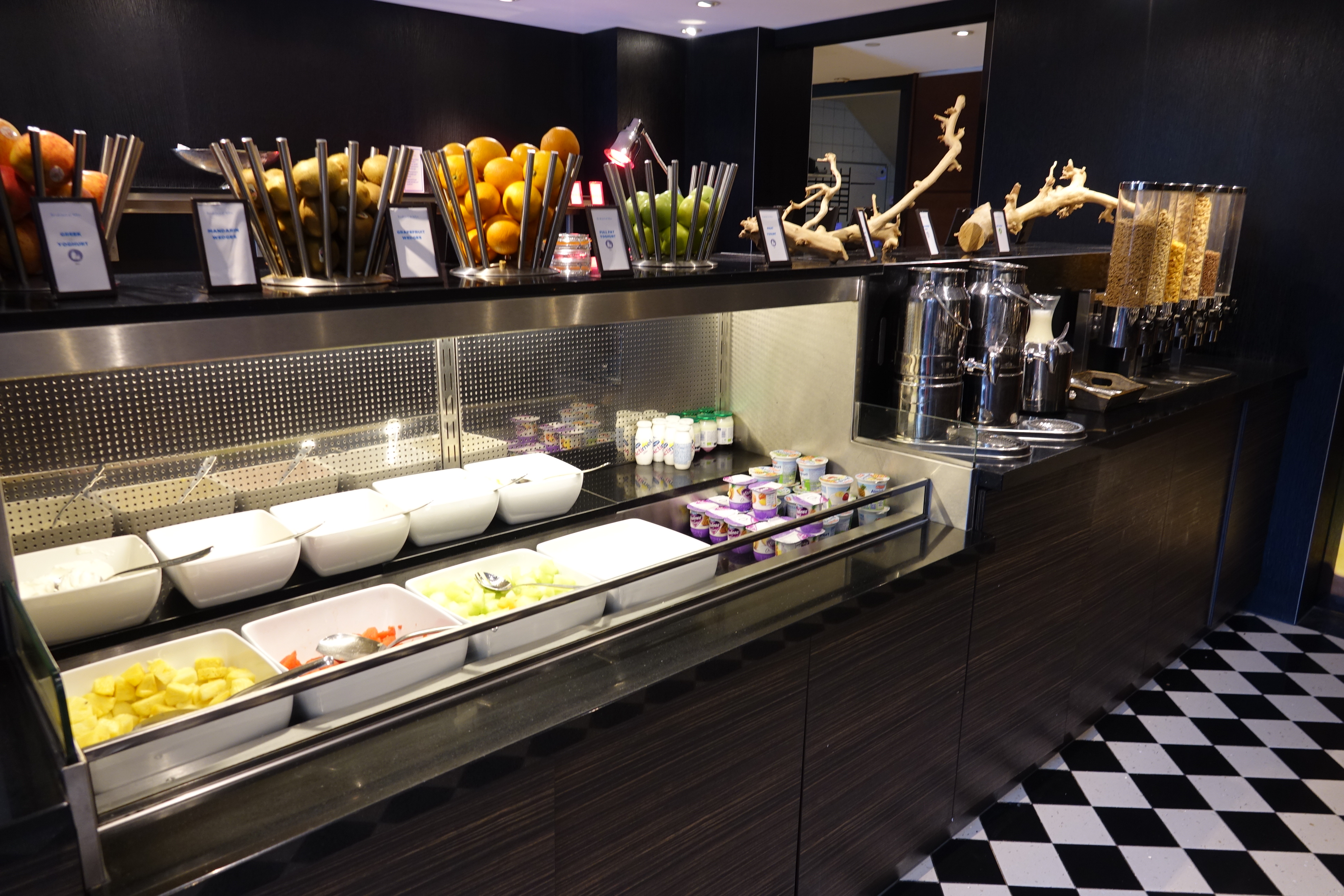 a buffet with fruit and yogurt