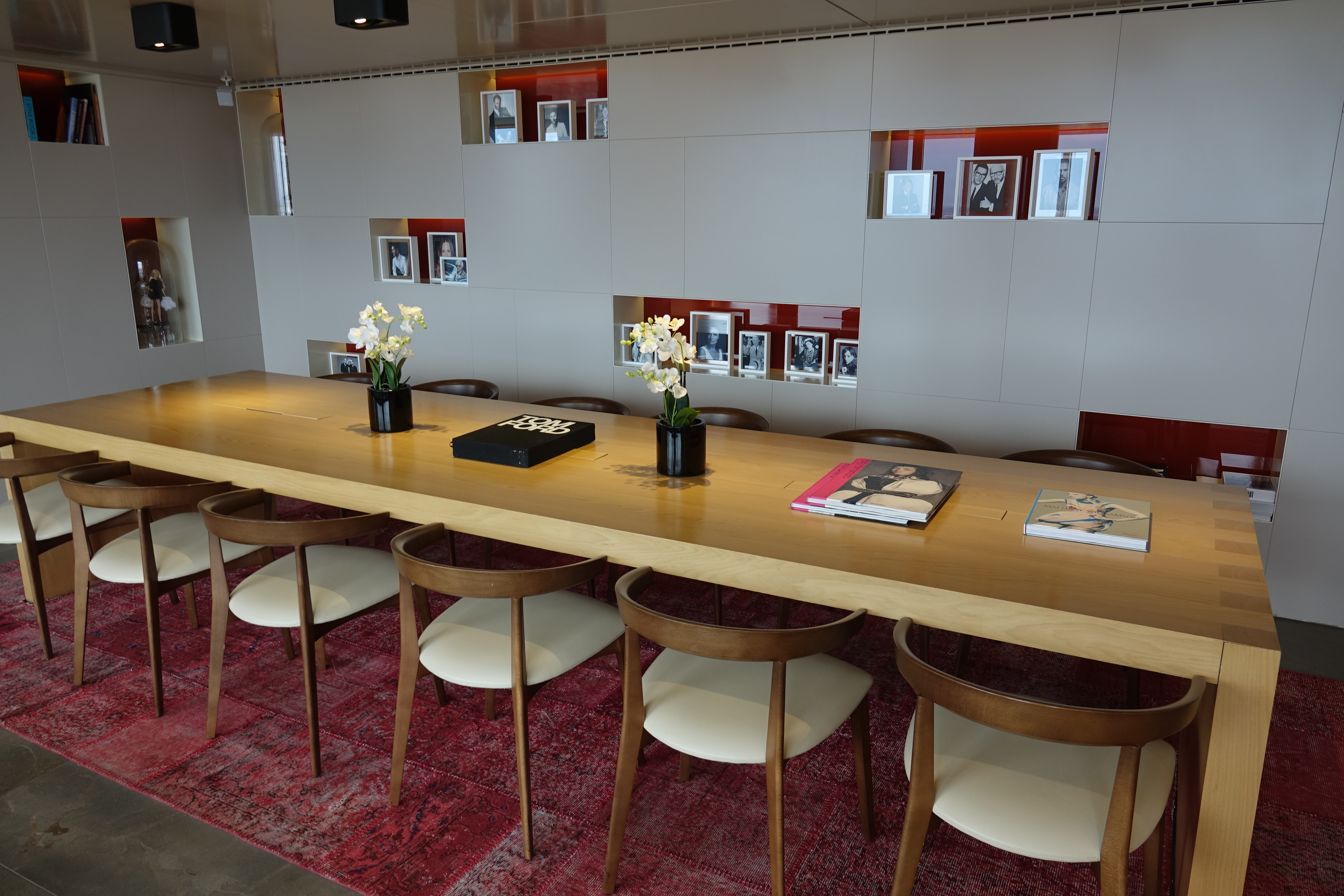 a table with chairs and a book on it