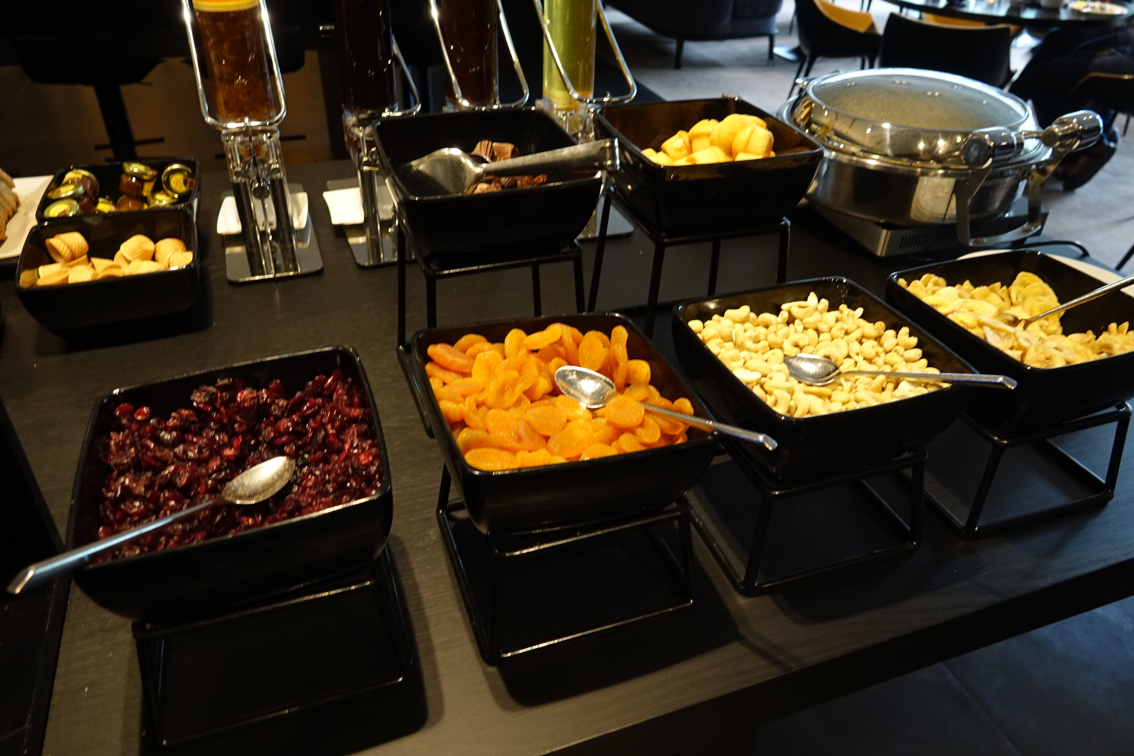 a buffet table with different kinds of food