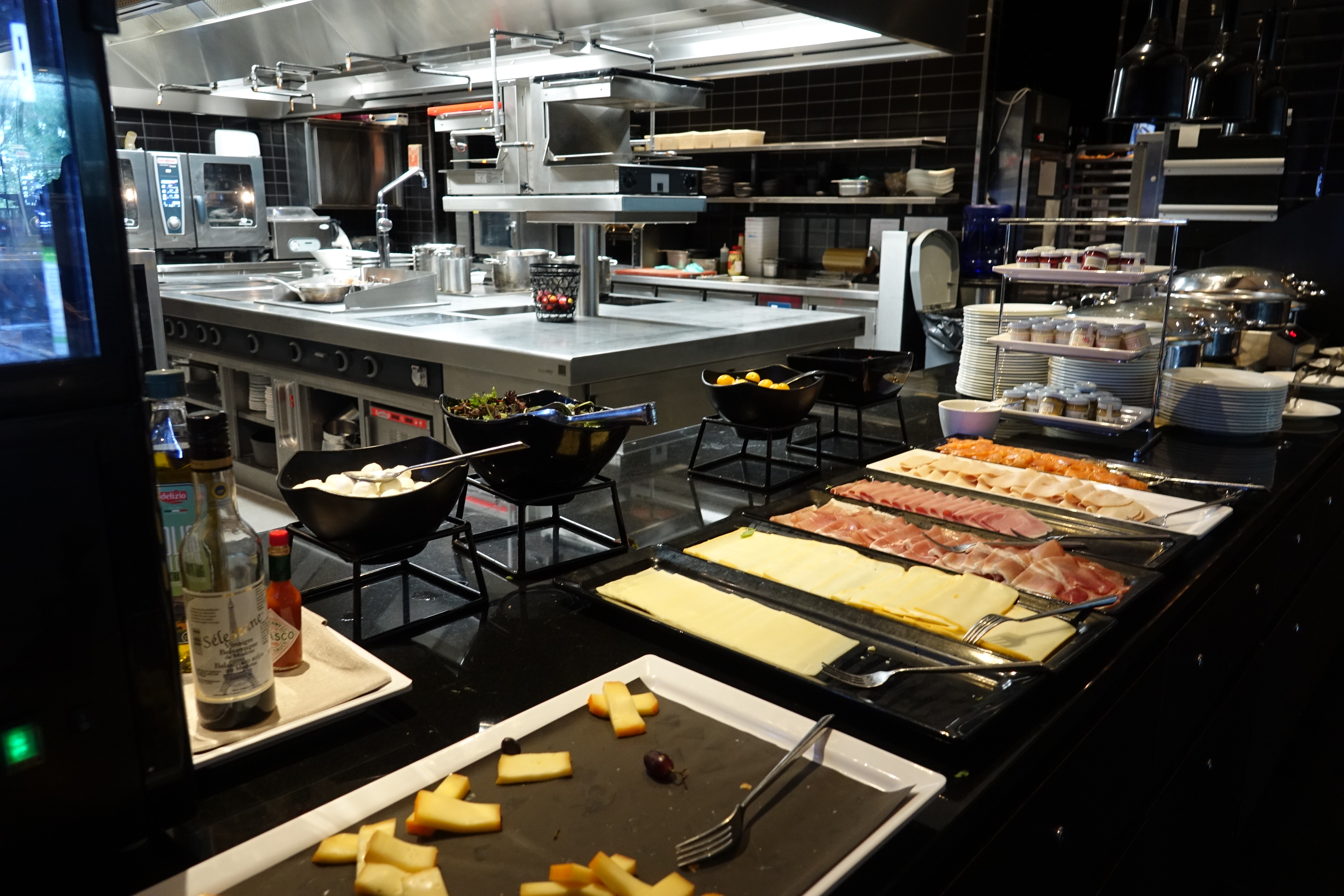 a kitchen with food on trays