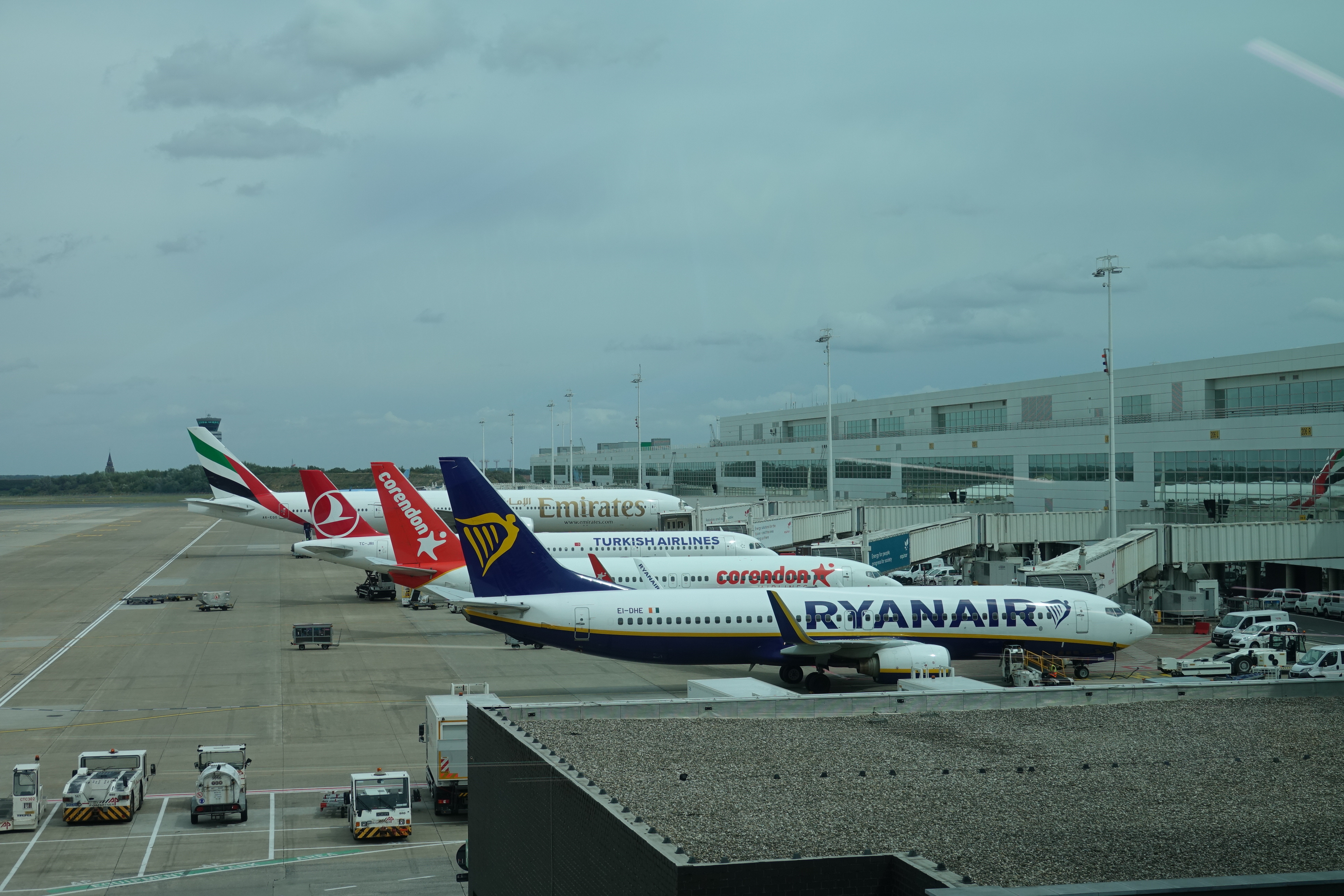 airplanes parked at an airport