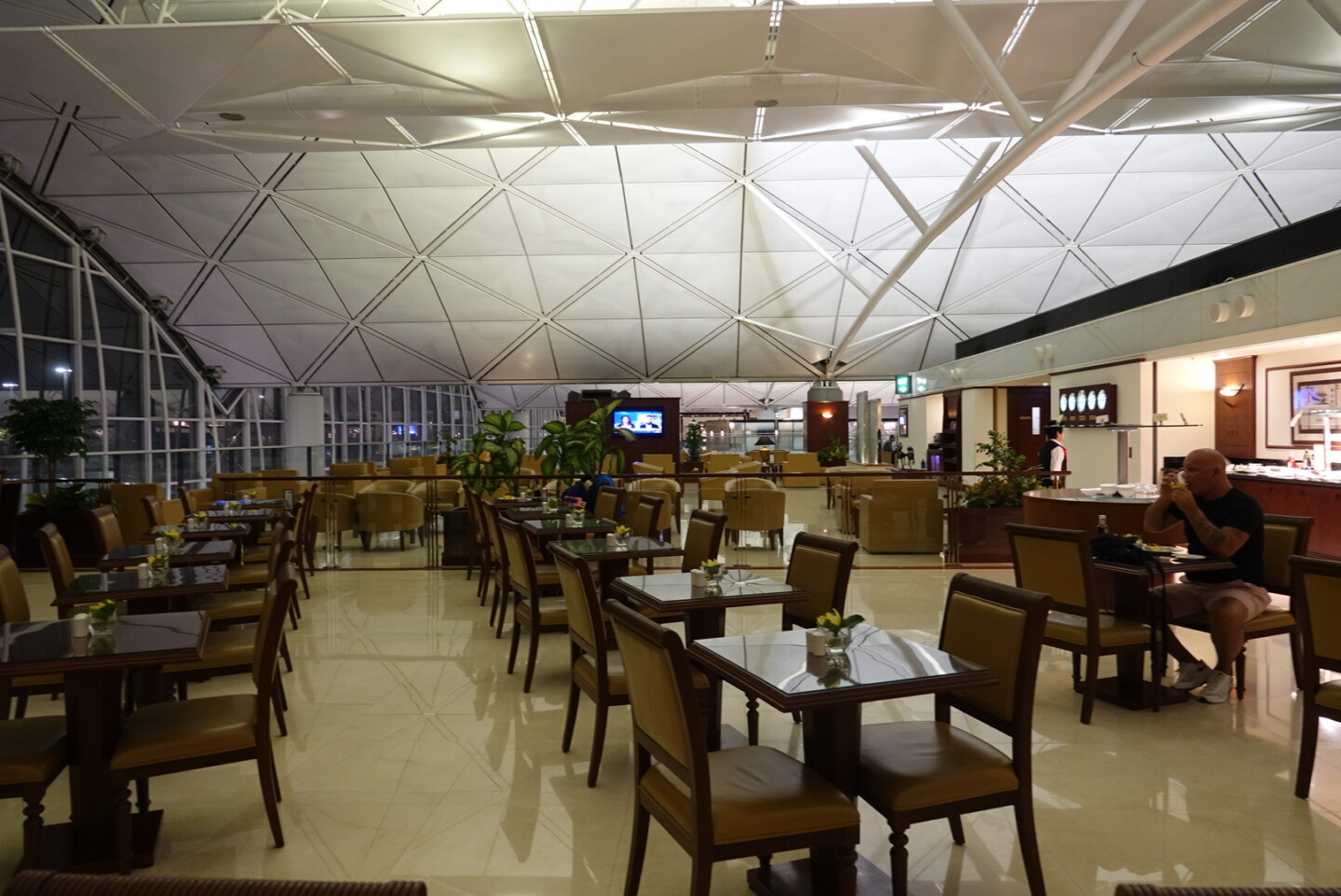 a large room with tables and chairs