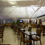 a large room with tables and chairs