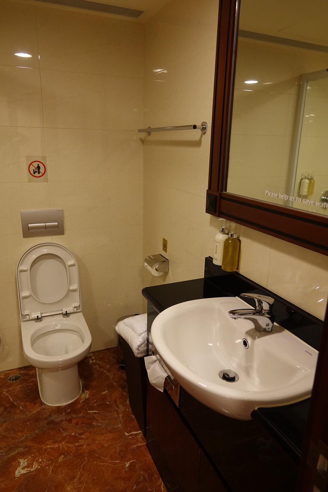 a bathroom with a sink and toilet