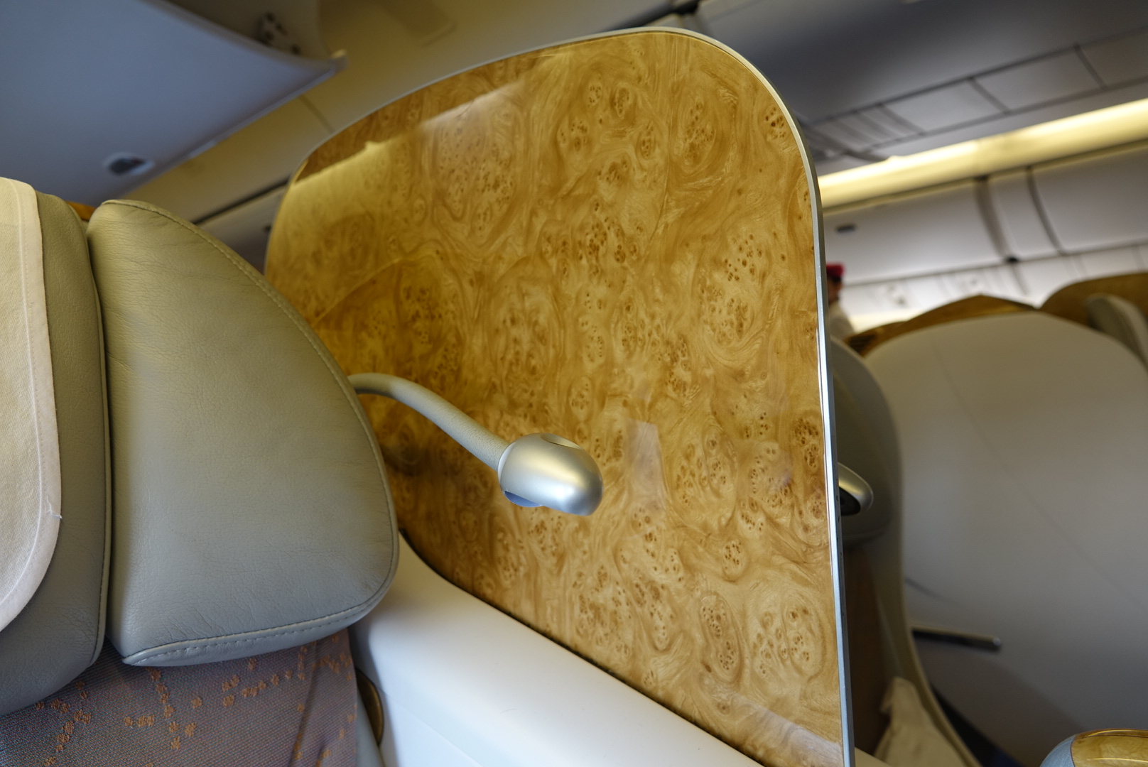 a wooden seat on a plane