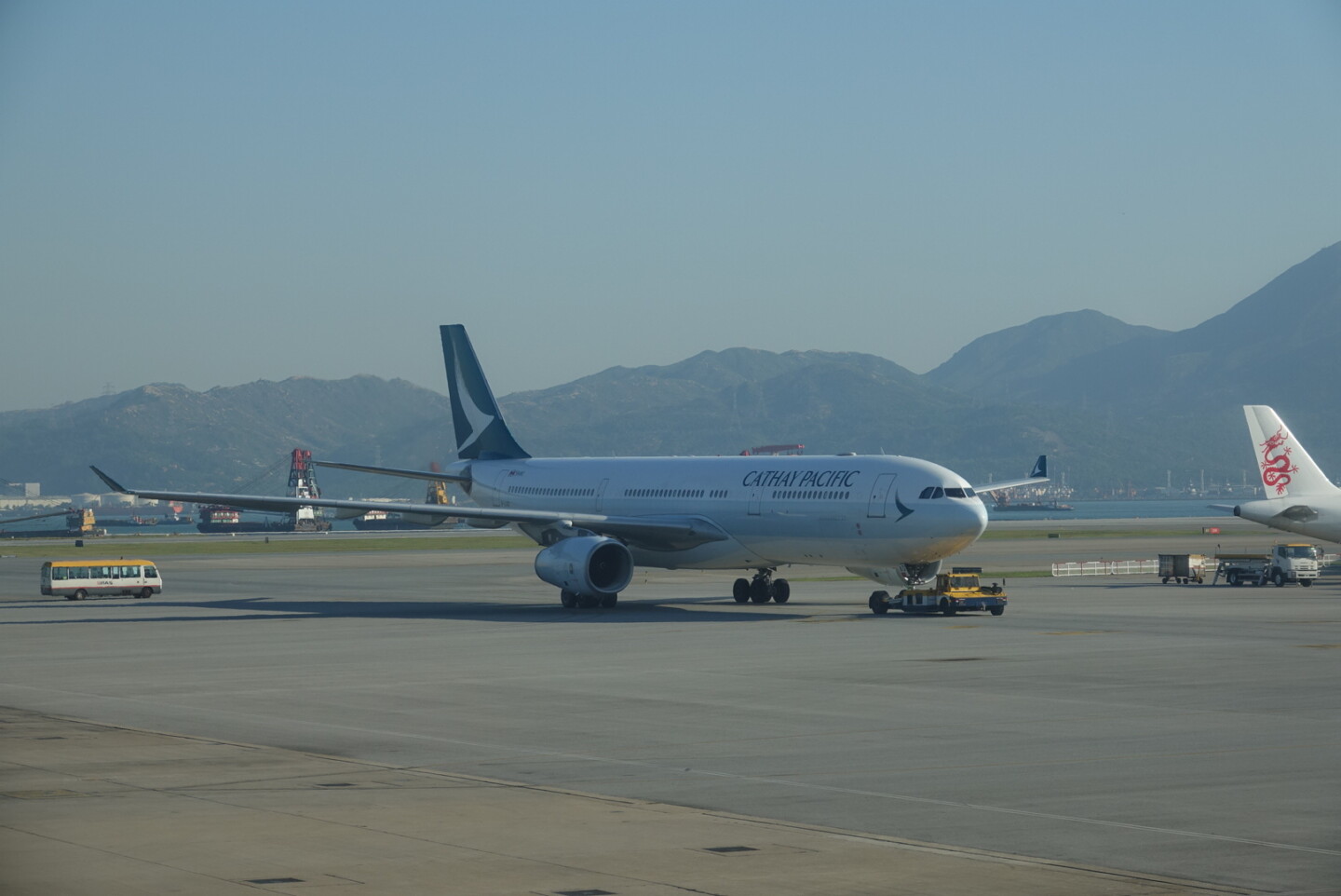 a white airplane on a runway