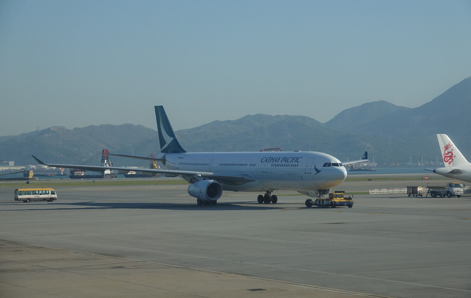 a white airplane on a runway