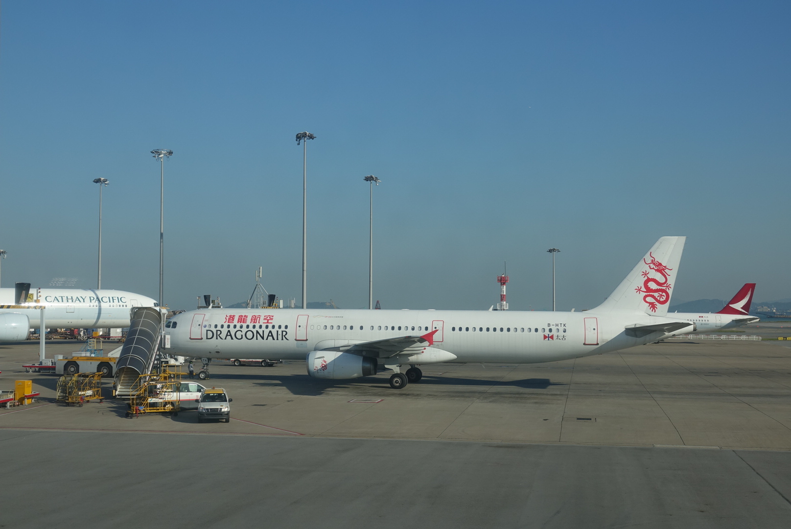 a white airplane on the tarmac