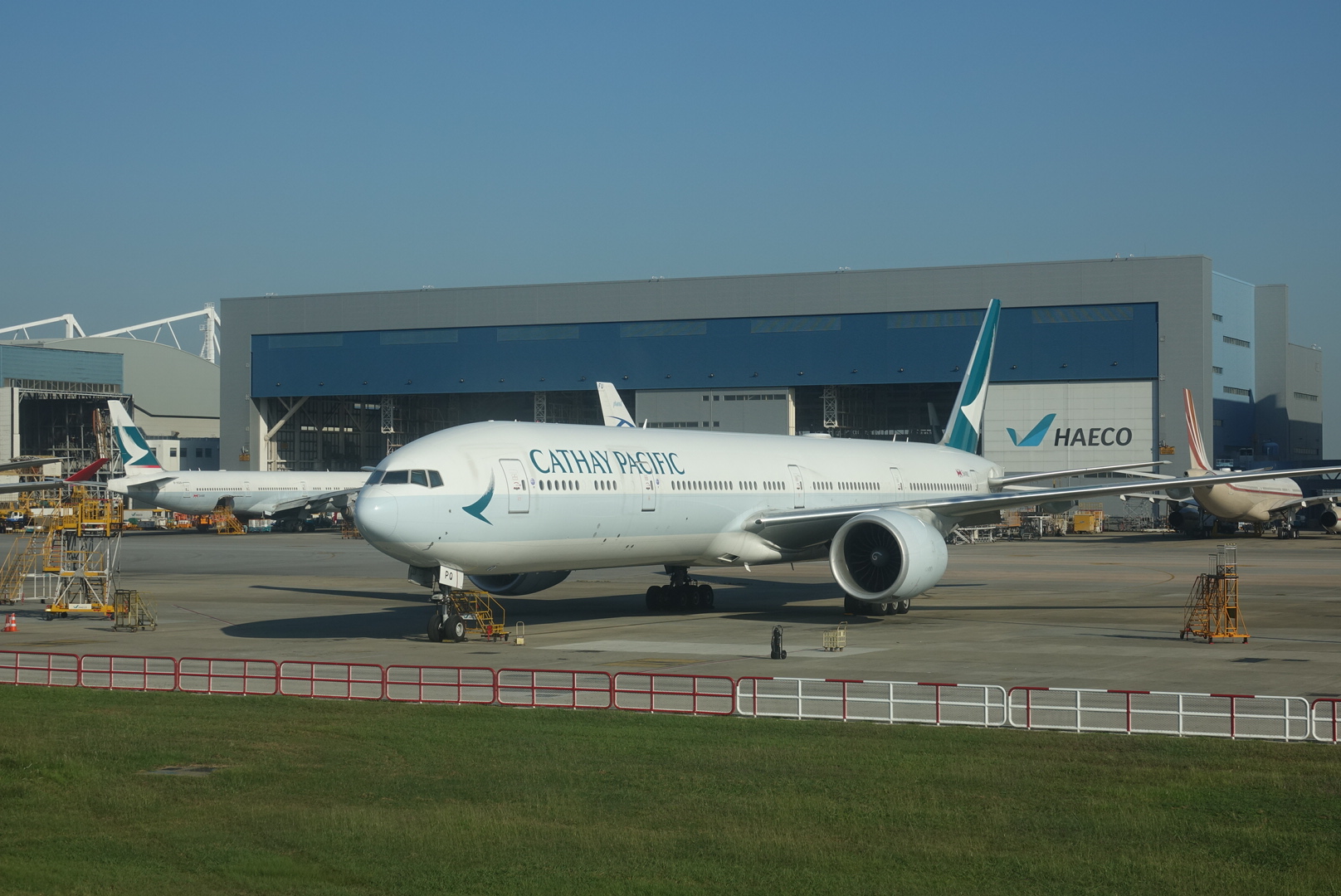 a large white airplane on the tarmac