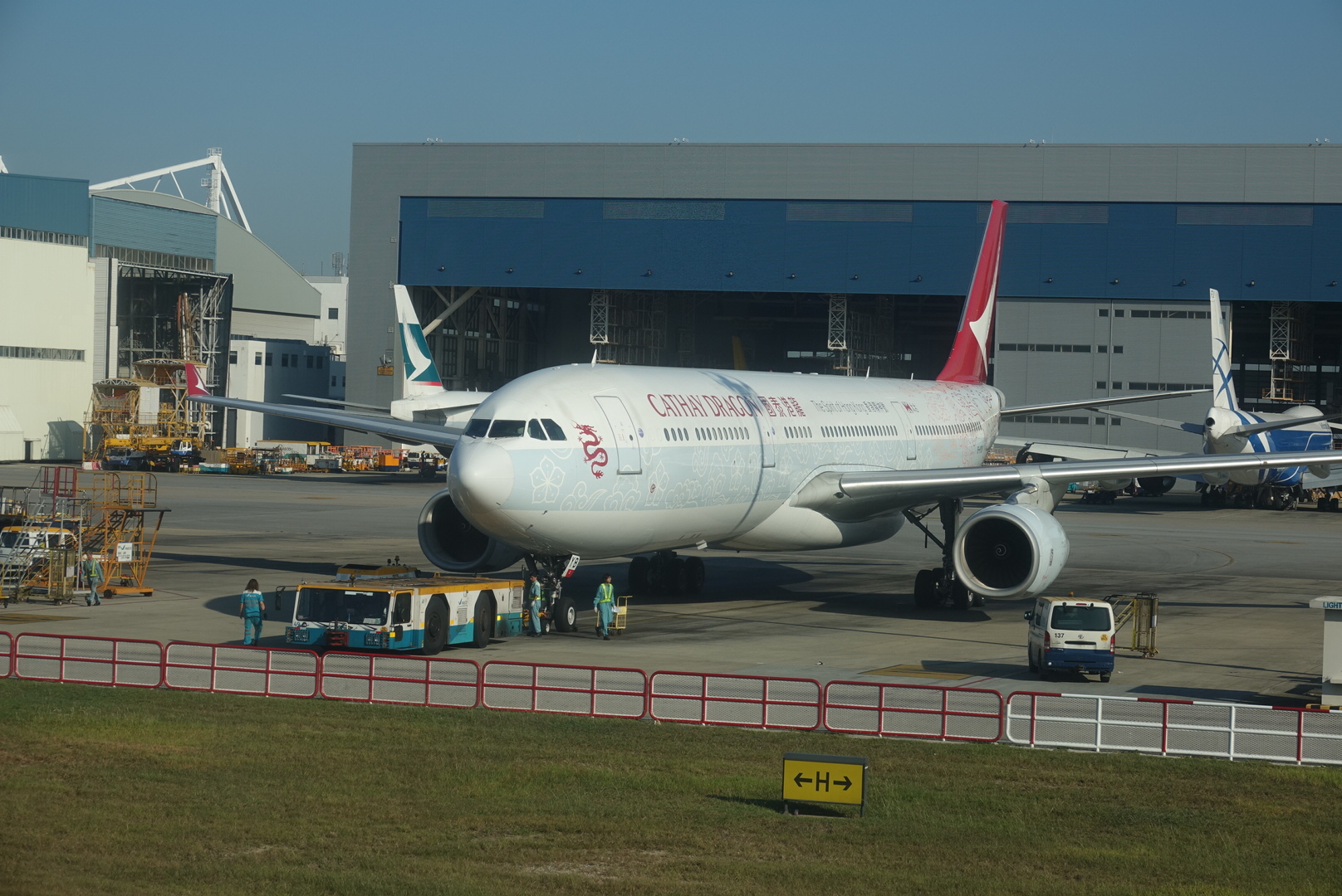 a large white airplane on the tarmac