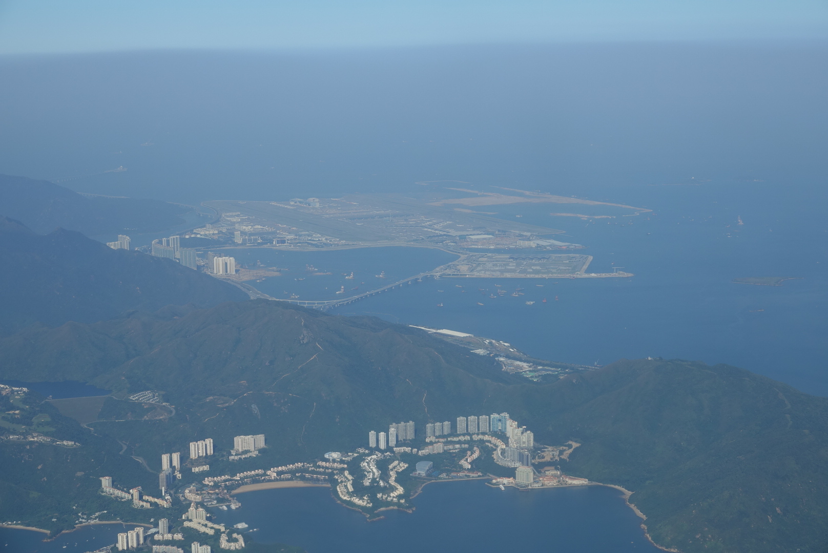 a aerial view of a city and water