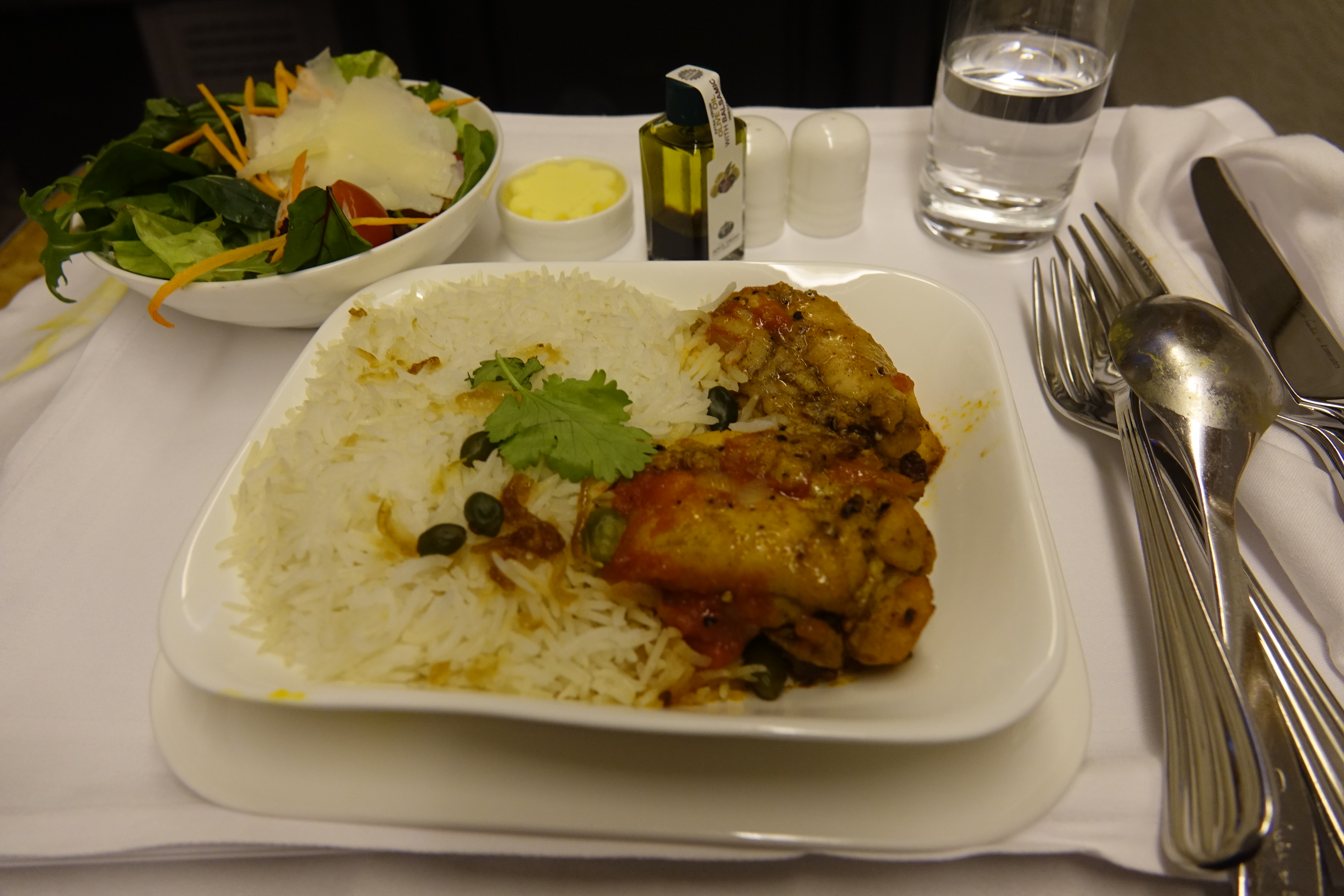 a plate of rice and chicken