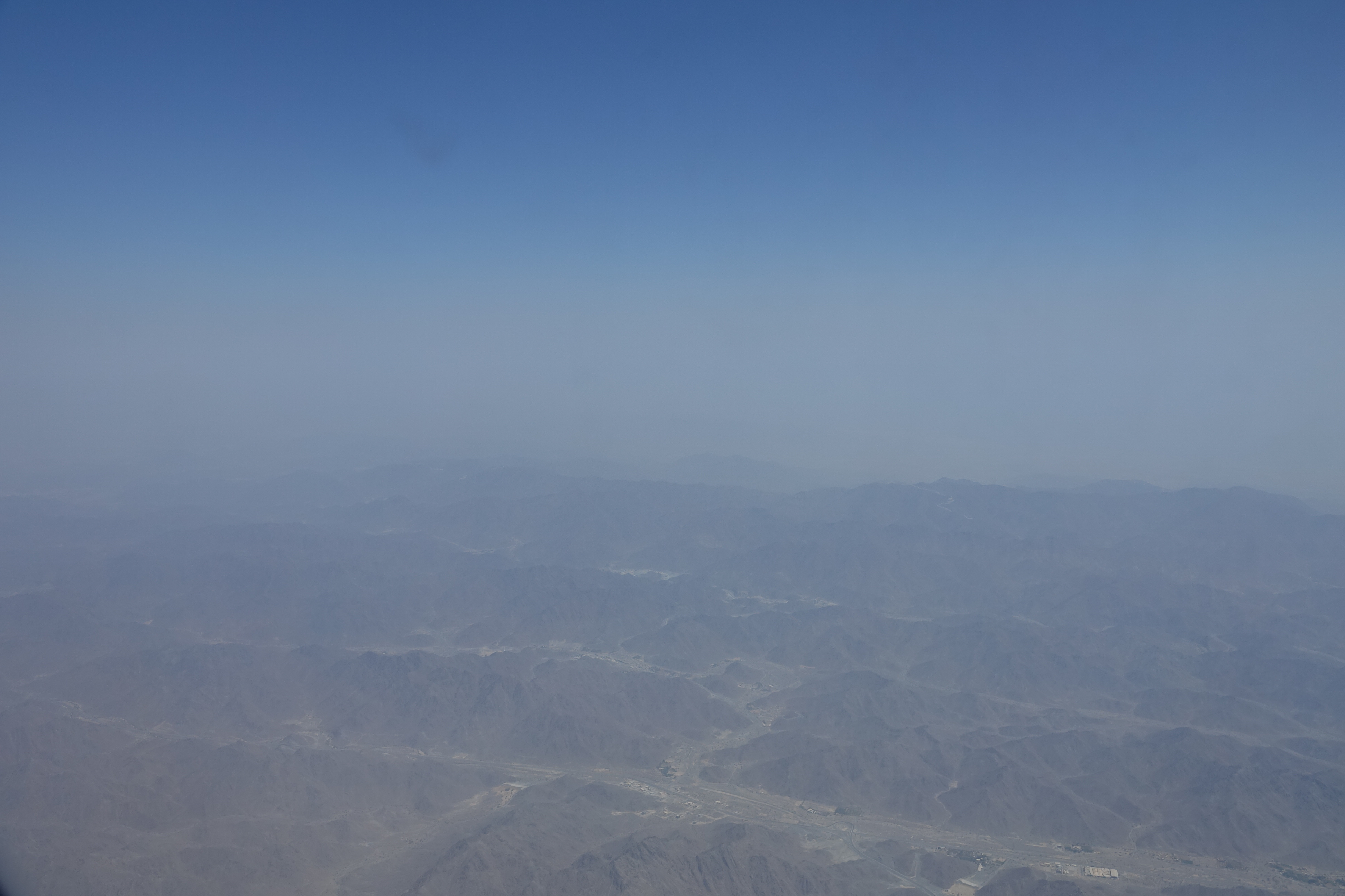 a view of a valley from an airplane