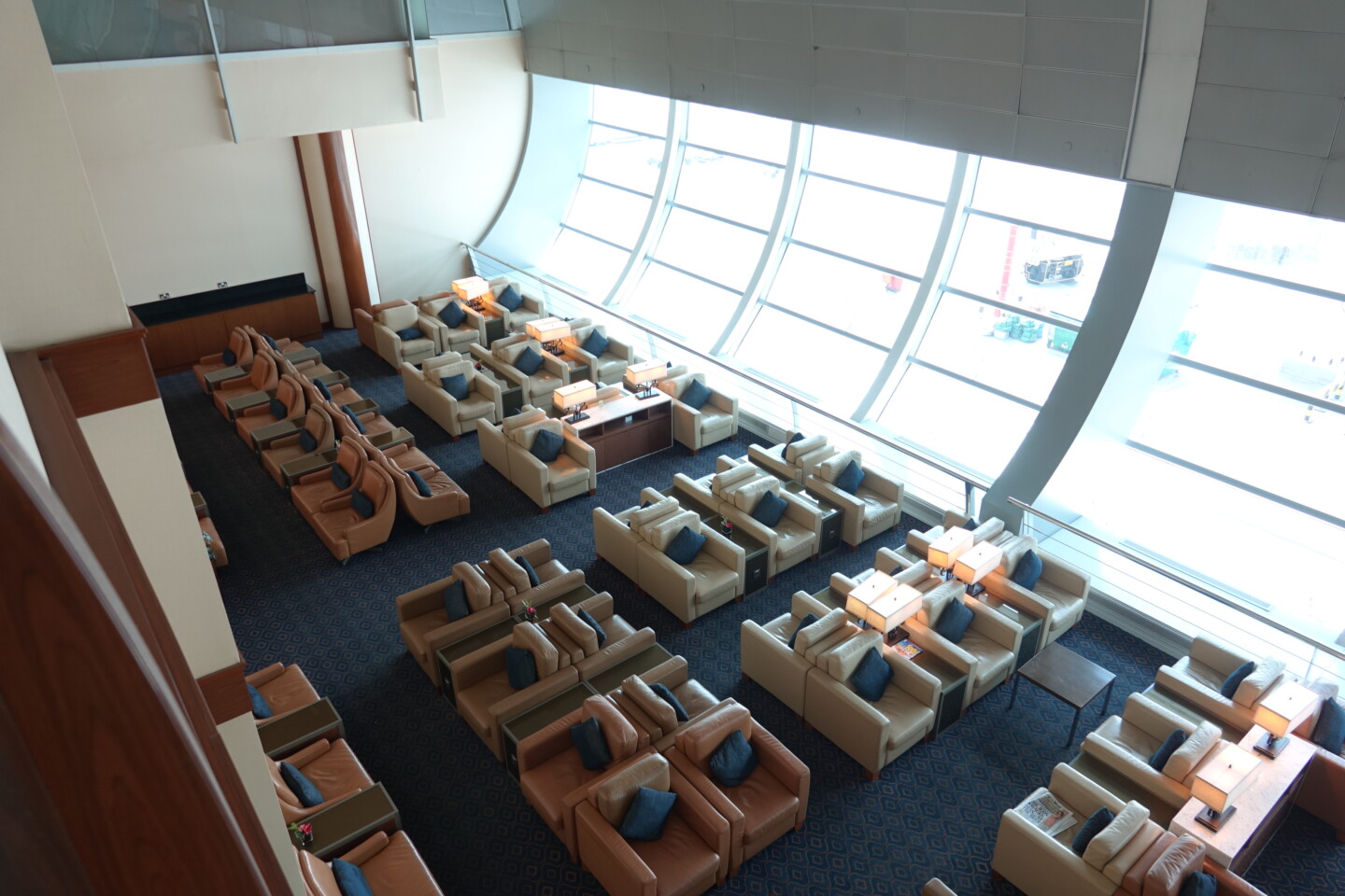 a room with many chairs and tables