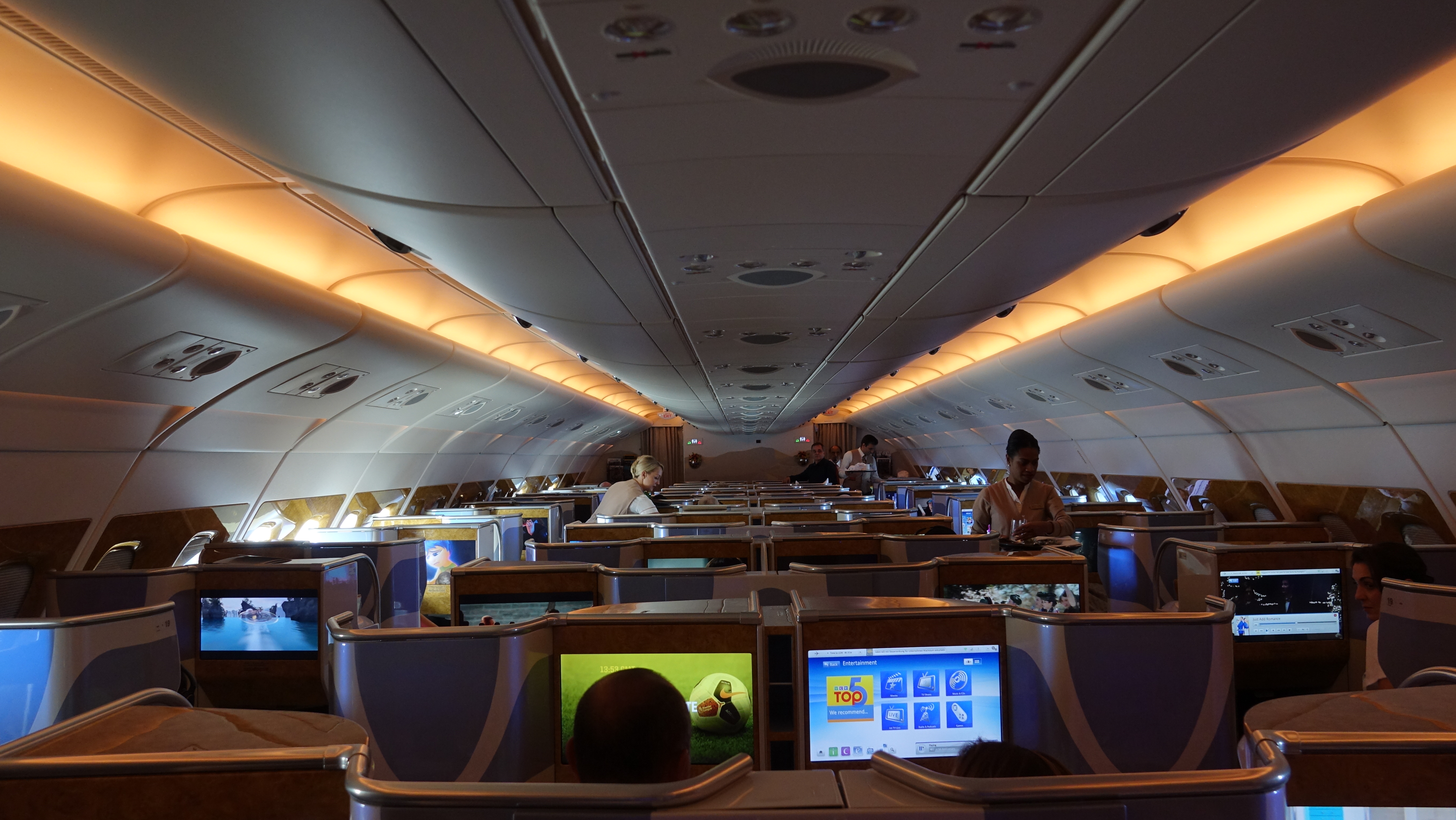 a group of people sitting in an airplane