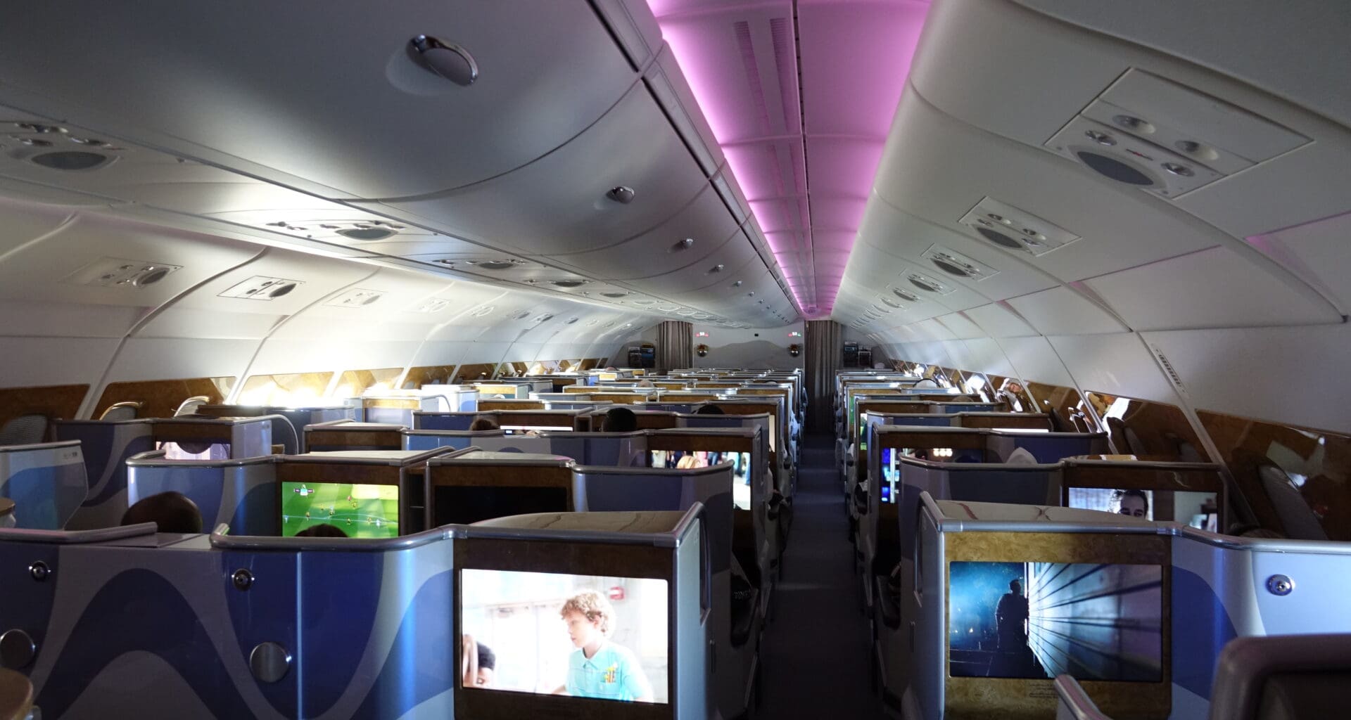 an airplane with seats and monitors