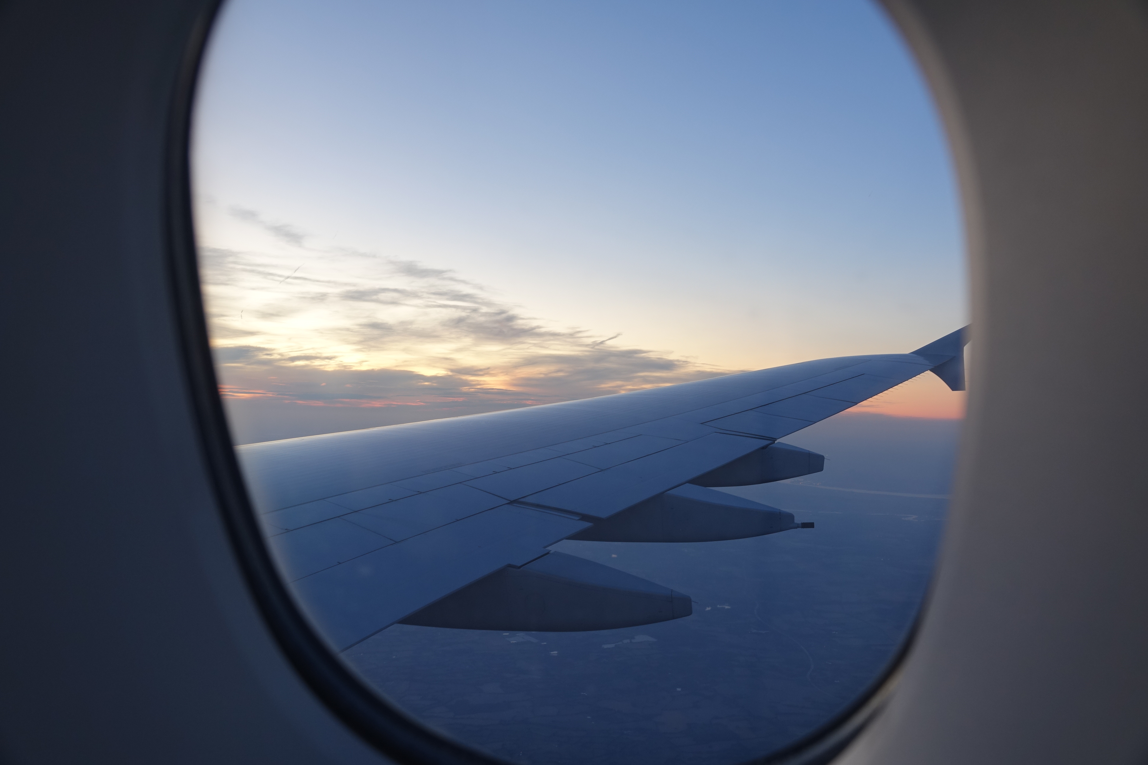 an airplane wing in the sky