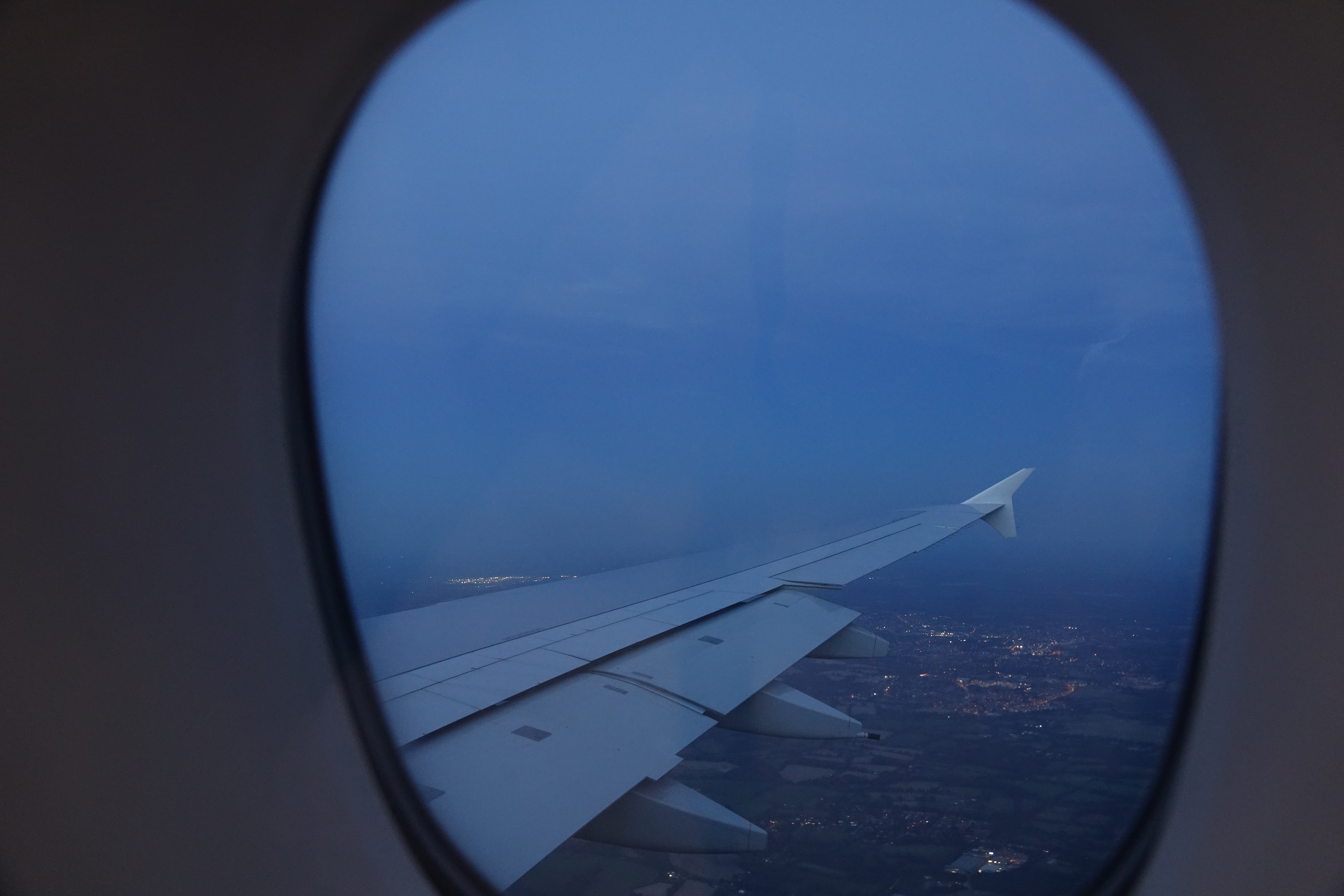 an airplane wing in the sky