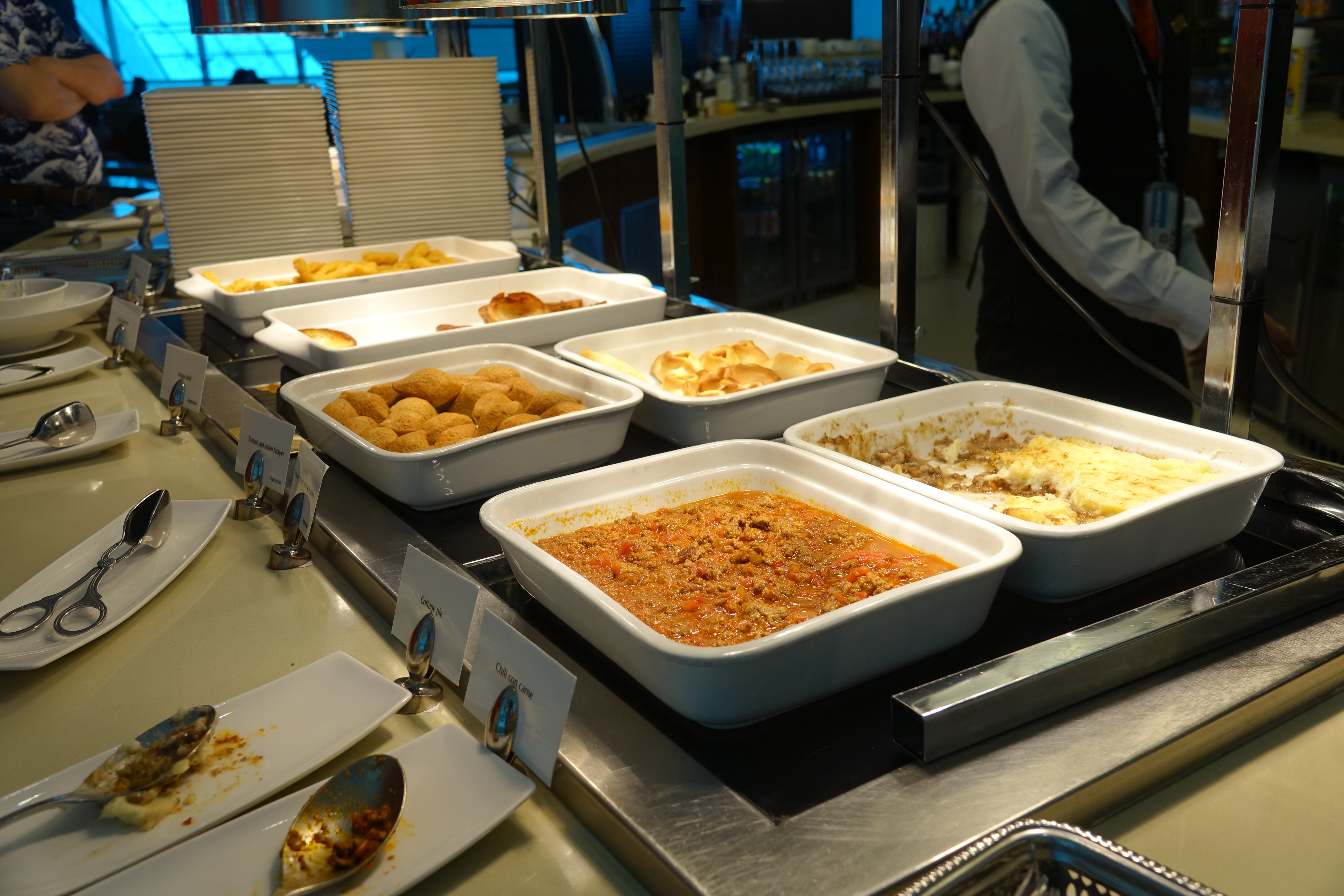 a buffet with food in containers