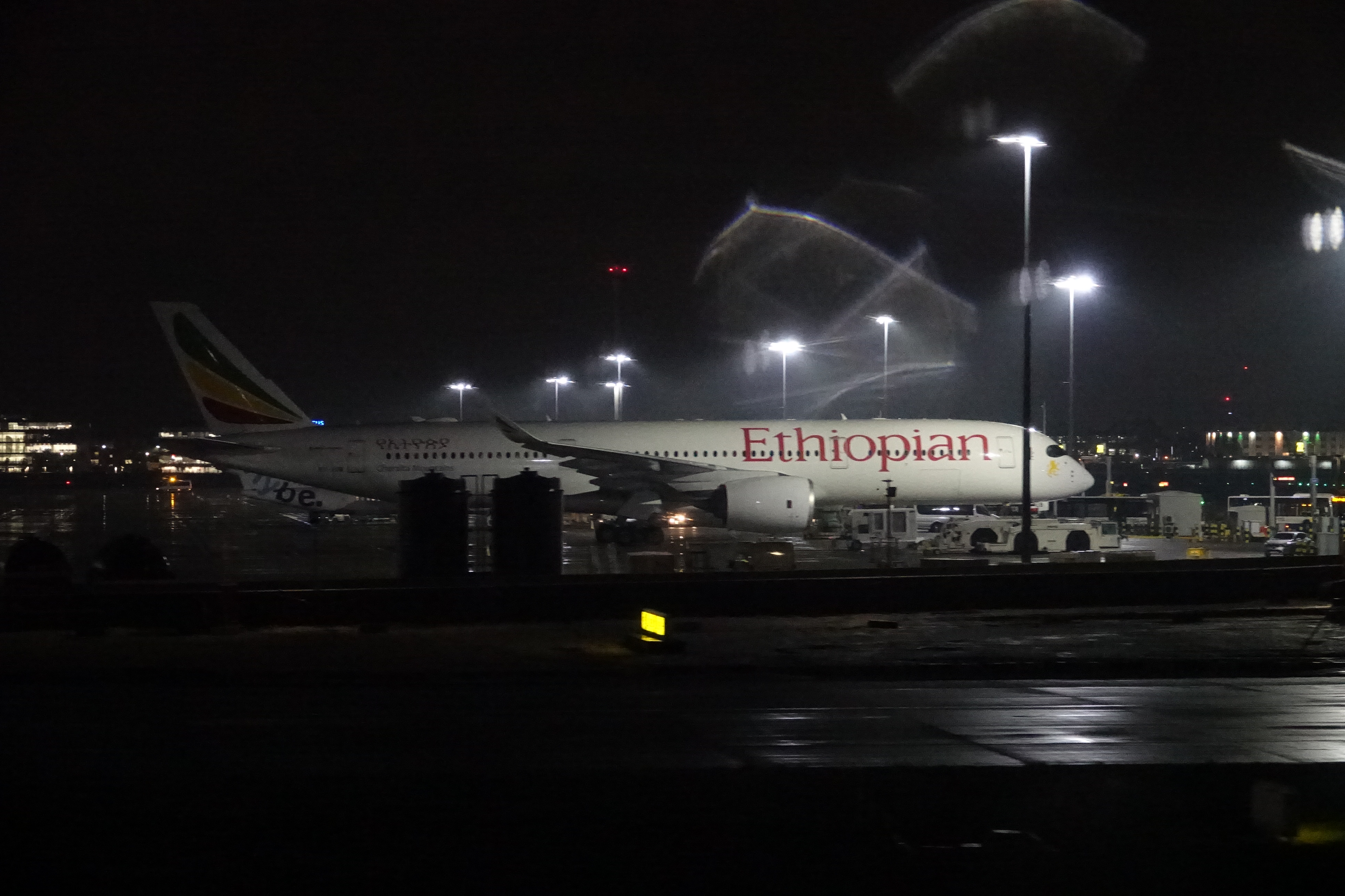 an airplane at night with lights