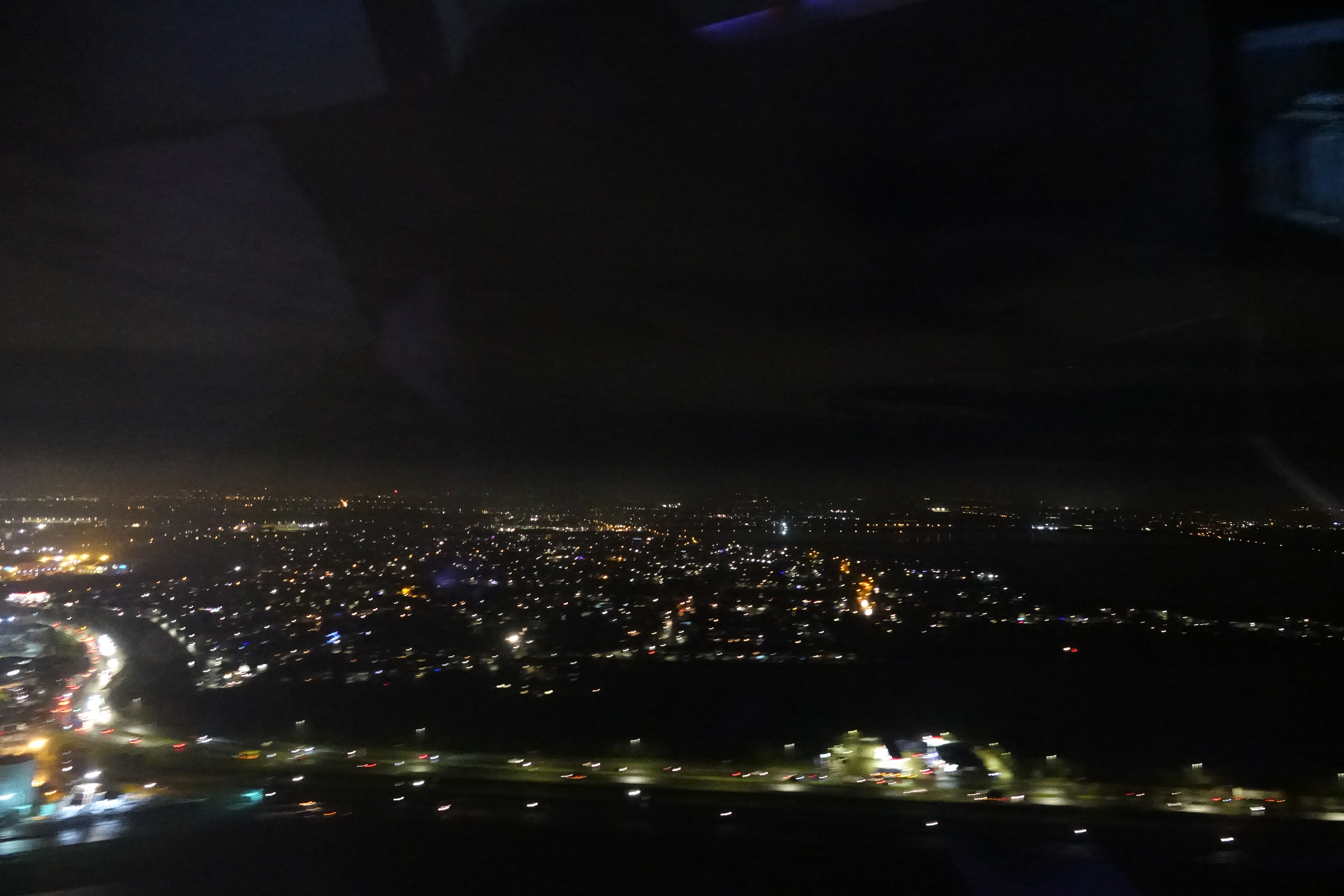 a city at night from above