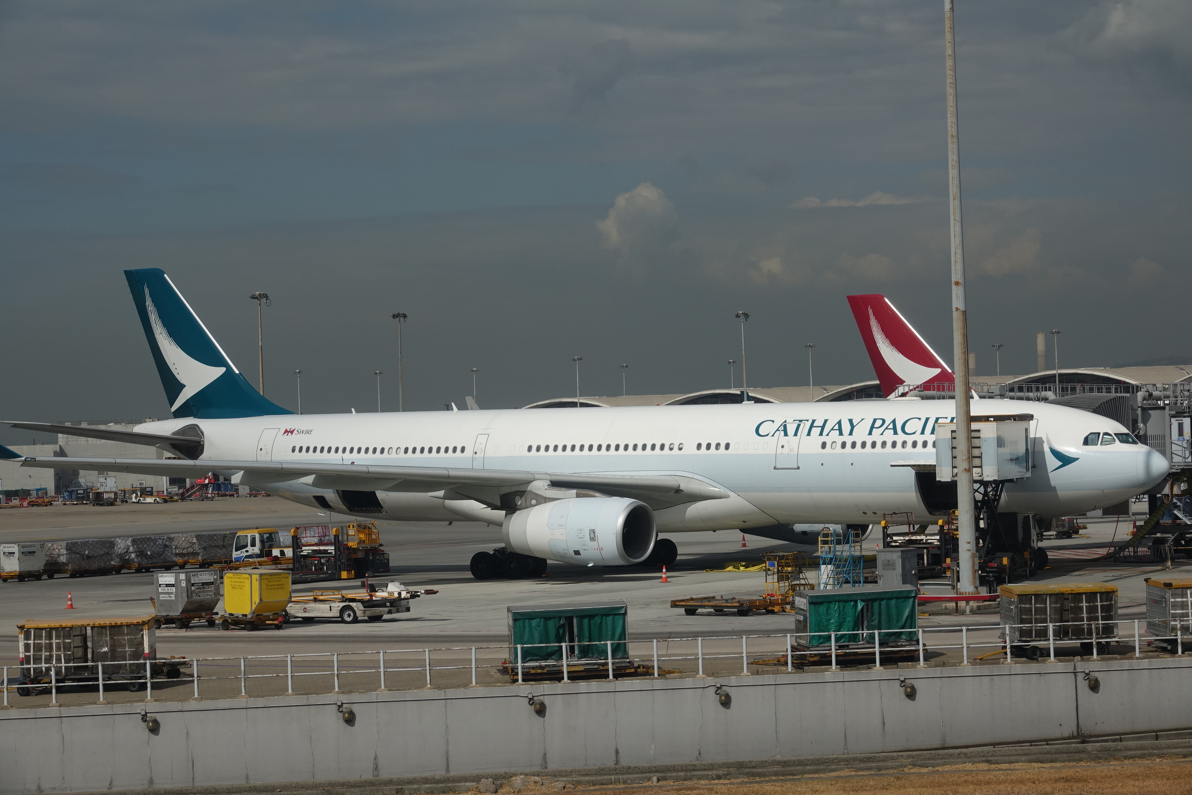 a large white airplane on a runway