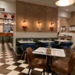 a restaurant with tables and chairs