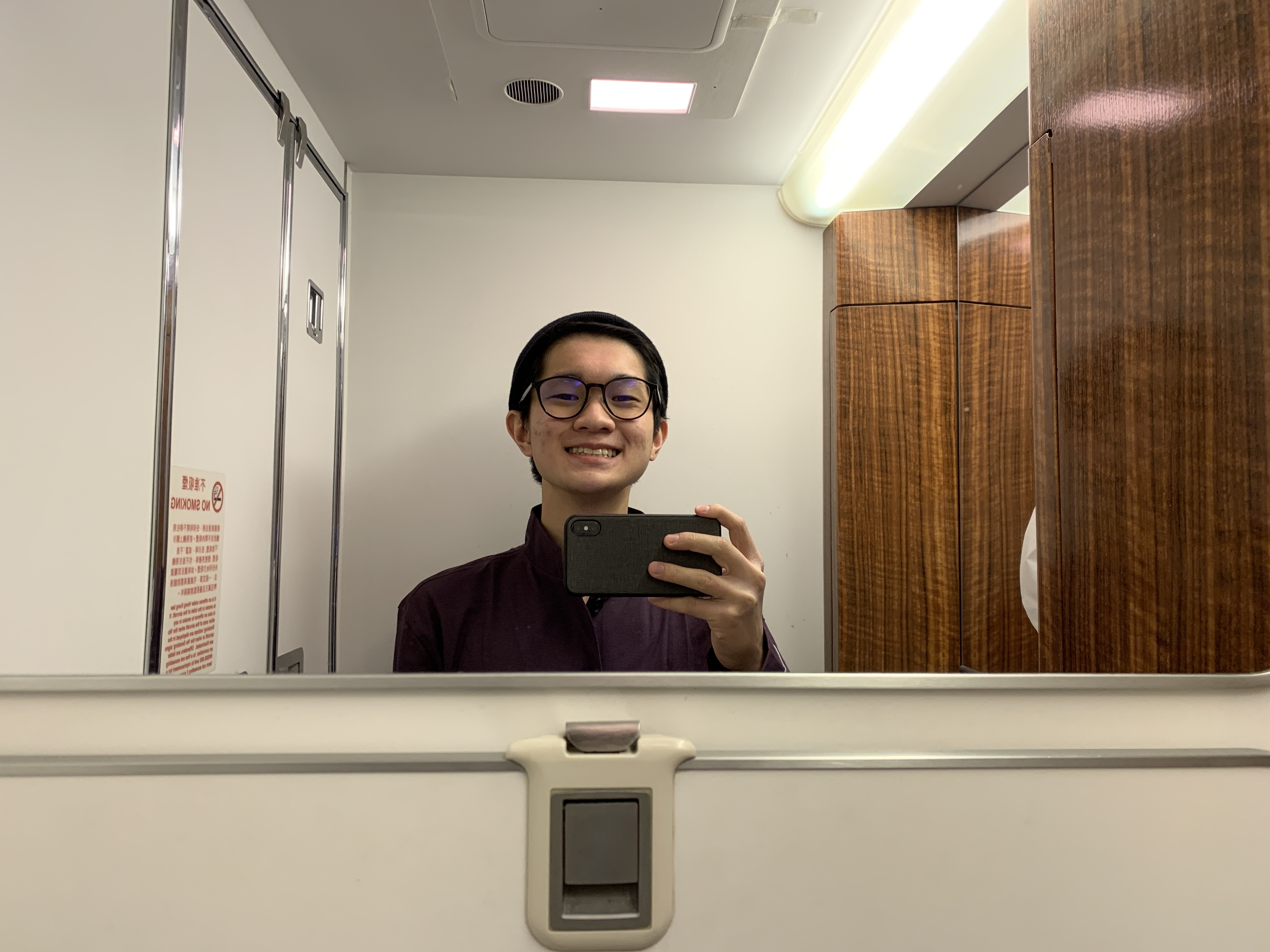 a man taking a selfie in a mirror