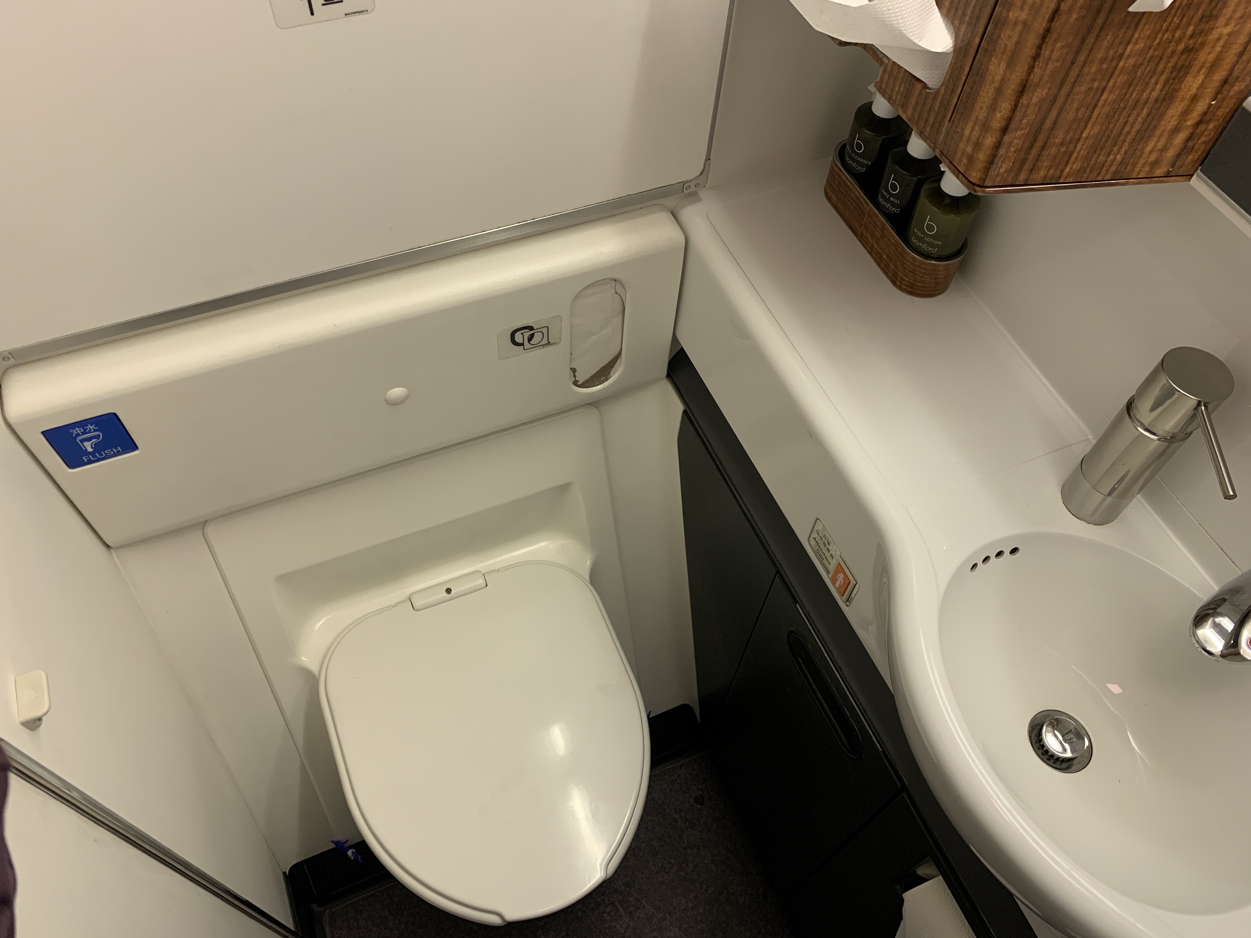 a toilet and sink in a bathroom