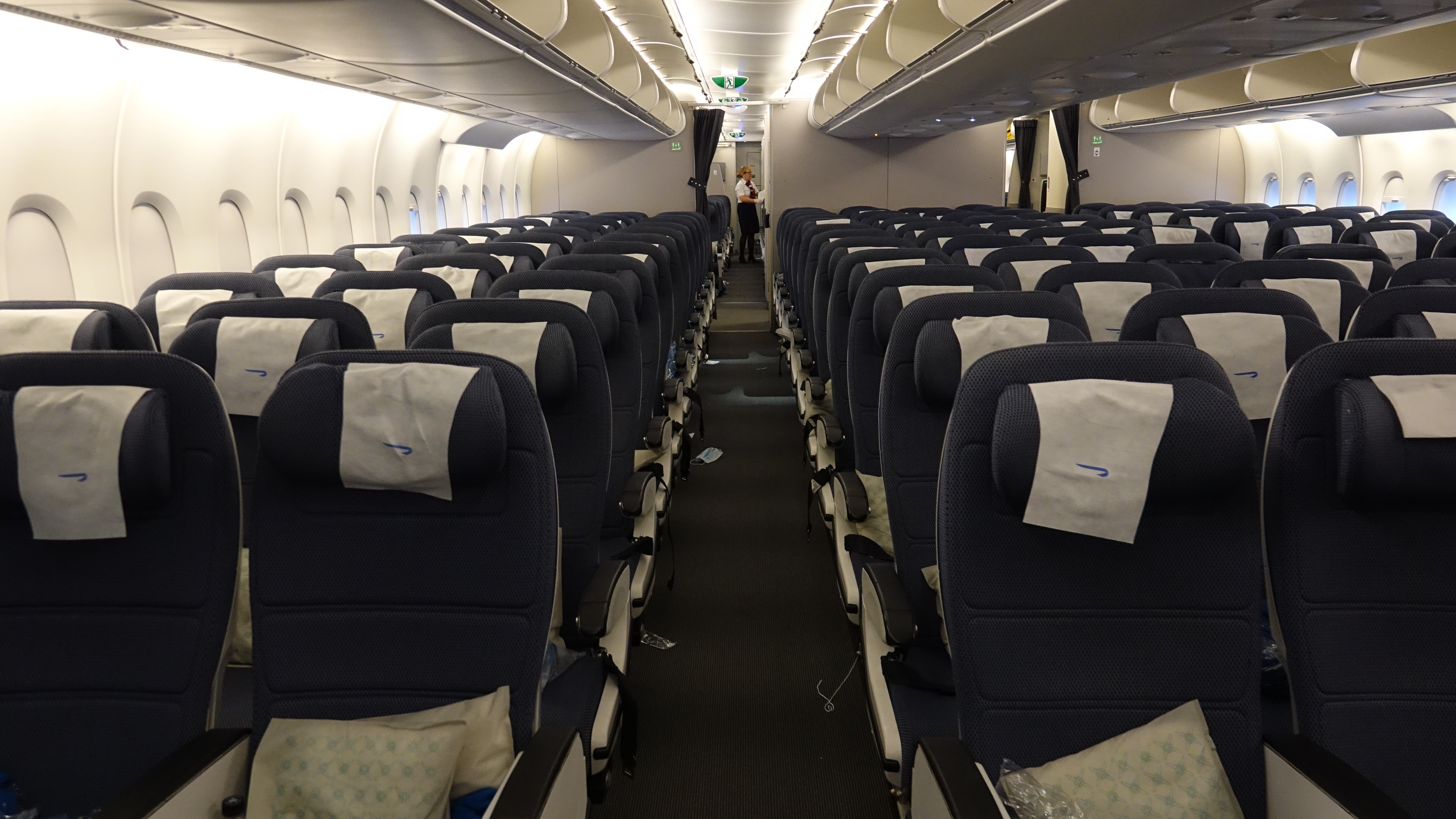 an airplane with rows of seats