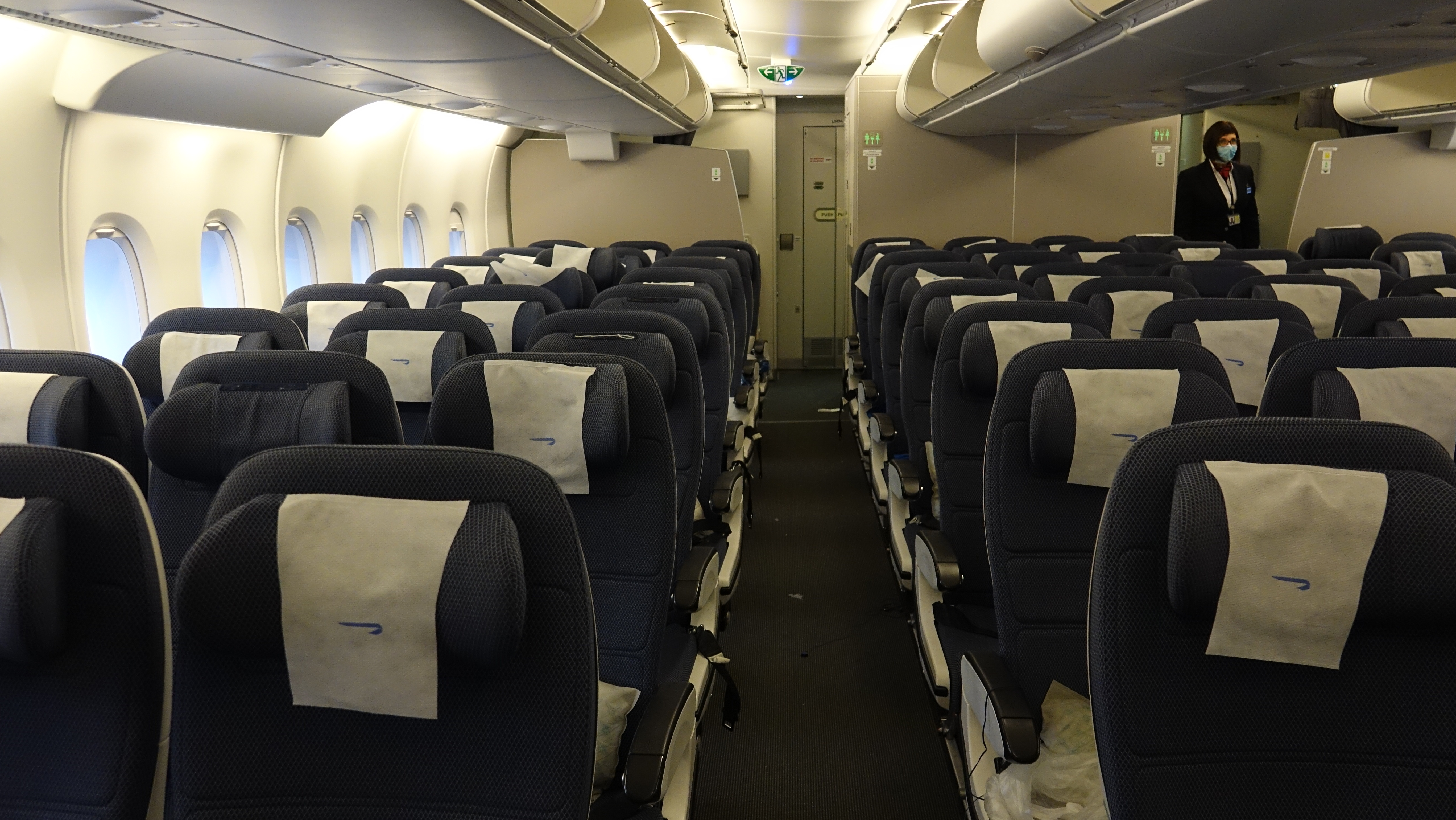 an airplane with rows of seats