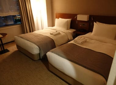 two beds in a hotel room