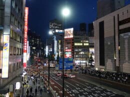 a city street with people walking on it