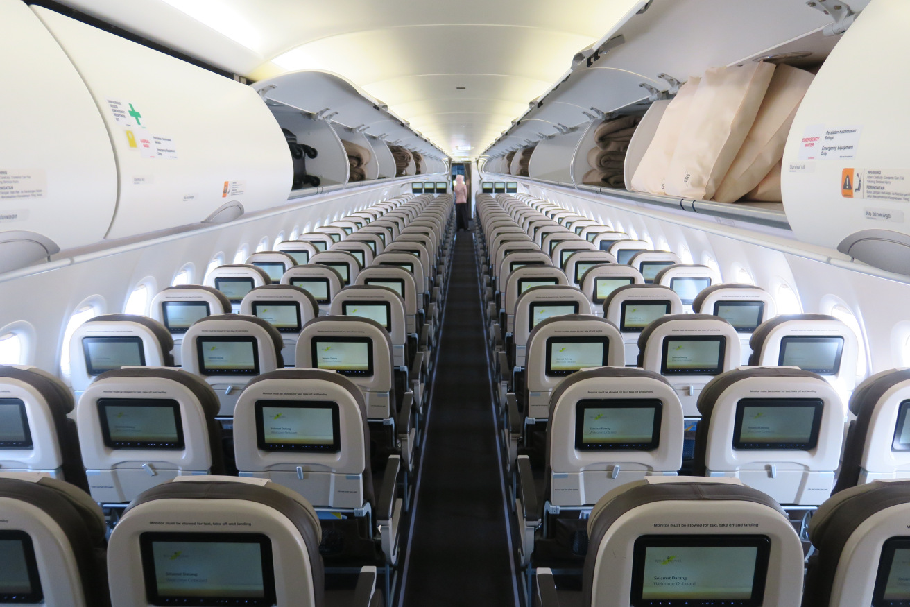 rows of seats in an airplane