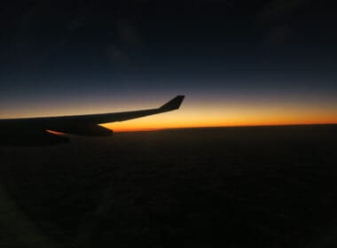 an airplane wing in the sky