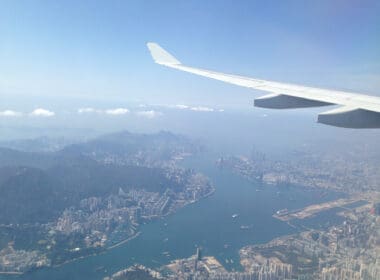 an airplane wing and water in the sky
