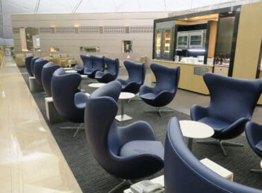 a room with chairs and tables