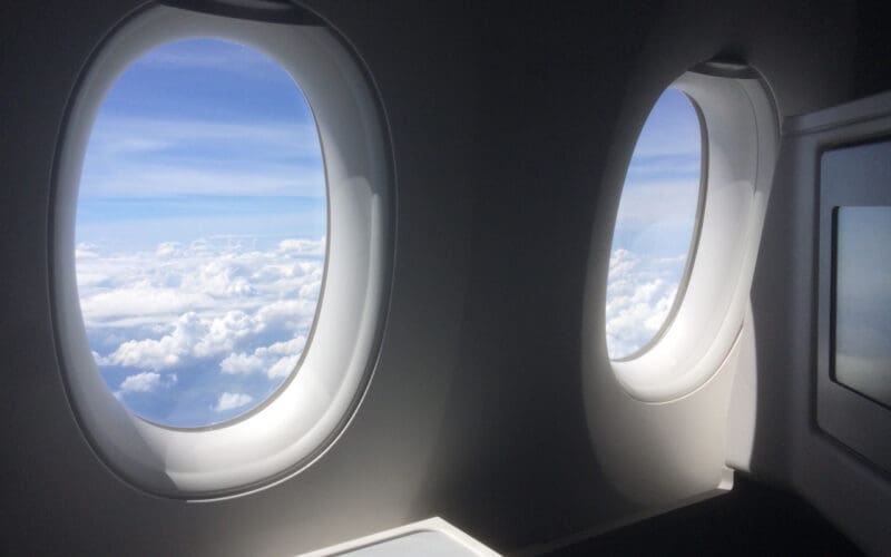 two windows with clouds in the sky